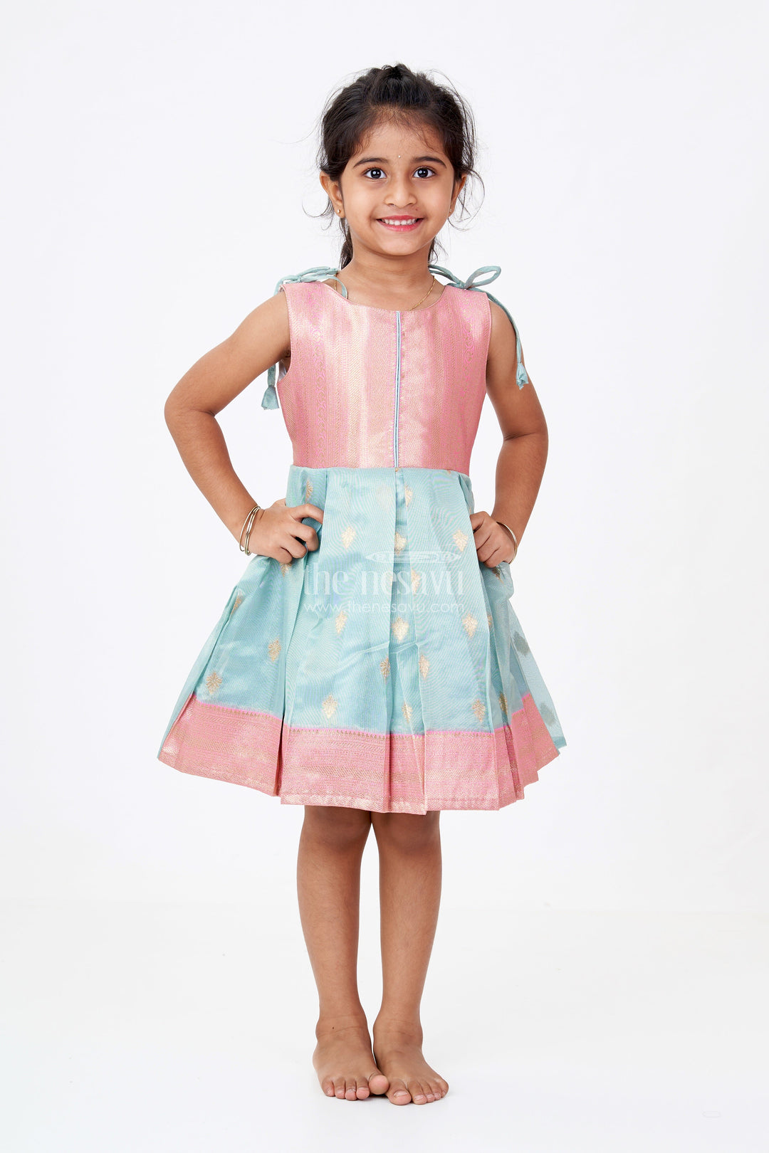 The Nesavu Silk Frock Graceful Girls Soft Silk Frock in Banarasi Jacquard with Dual-Tone Elegance Nesavu Nesavu Girls Soft Silk Frock Banarasi Jacquard Gold Zari Tie-Up Details