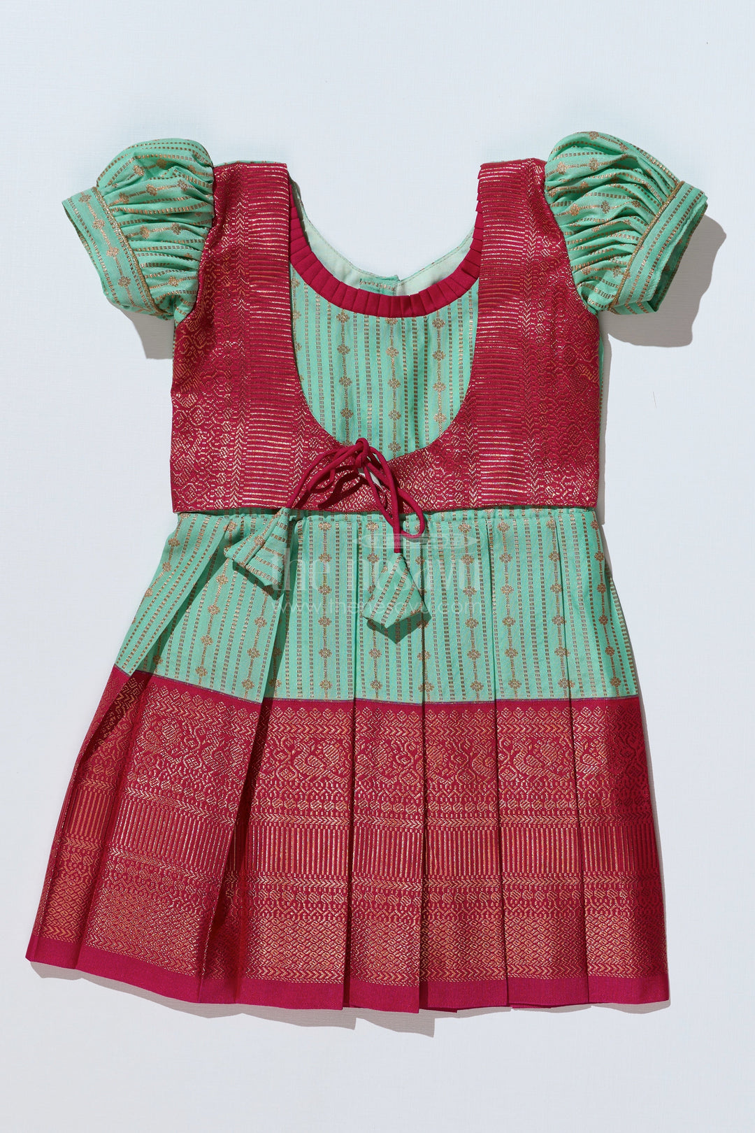 The Nesavu Girls Kanchi Silk Frock Graceful Light Green Silk Dress for Girls with Kanchipuram Inspired Design and Zari Pleated Border Nesavu Nesavu Light Green Silk Dress Girls Kanchipuram Inspired Design Zari Pleated Border