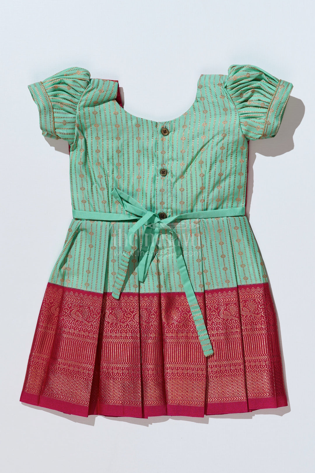 The Nesavu Girls Kanchi Silk Frock Graceful Light Green Silk Dress for Girls with Kanchipuram Inspired Design and Zari Pleated Border Nesavu Nesavu Light Green Silk Dress Girls Kanchipuram Inspired Design Zari Pleated Border