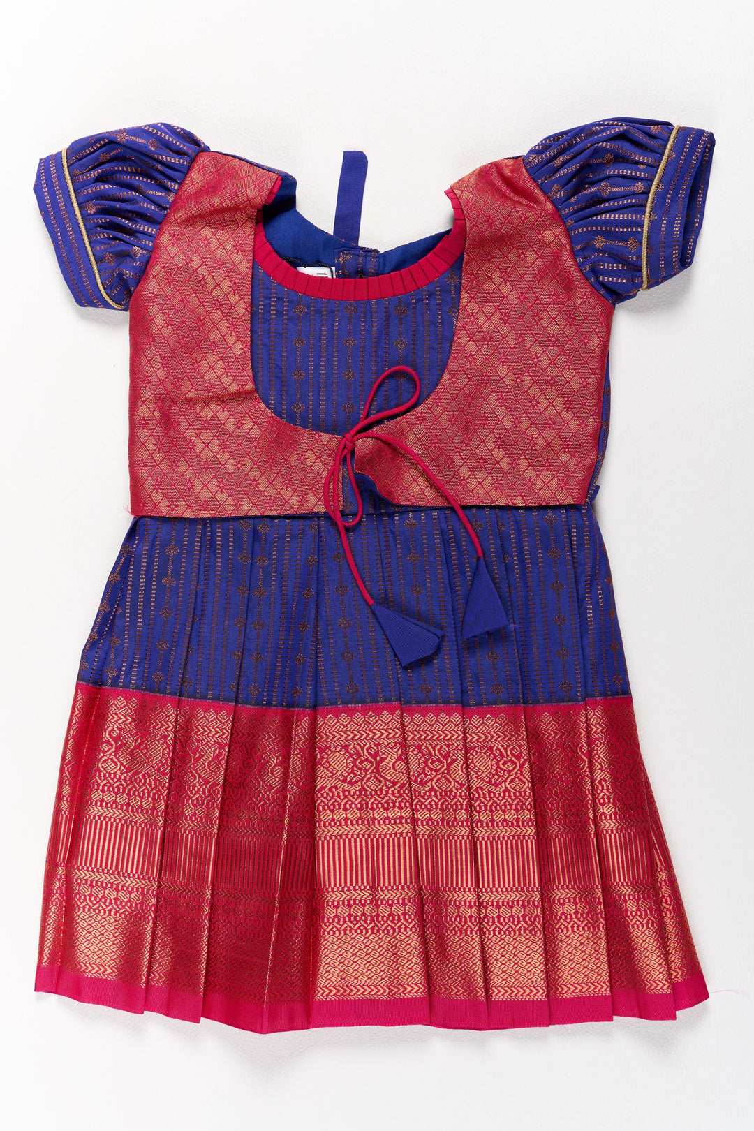 The Nesavu Silk Frock Graceful Purple and Pink Pattu Saree Frock for Girls with Zari Borders and Tie-Up Back Nesavu 16 (1Y) / Purple / Style 1 SF822CA-16 Nesavu Graceful Purple Pink Pattu Saree Frock Girls Zari Borders Tie-Up Back