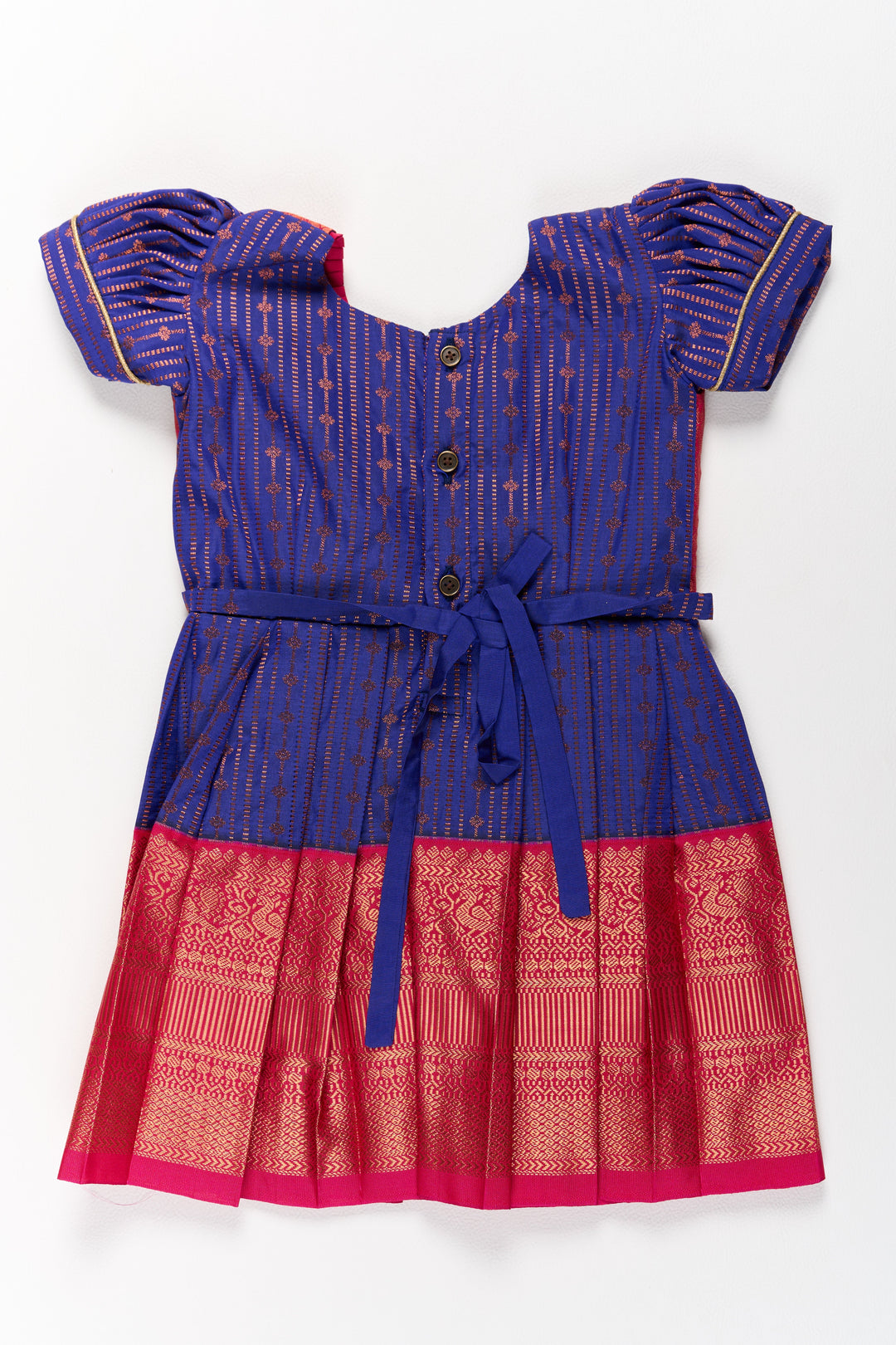 The Nesavu Silk Frock Graceful Purple and Pink Pattu Saree Frock for Girls with Zari Borders and Tie-Up Back Nesavu Nesavu Graceful Purple Pink Pattu Saree Frock Girls Zari Borders Tie-Up Back