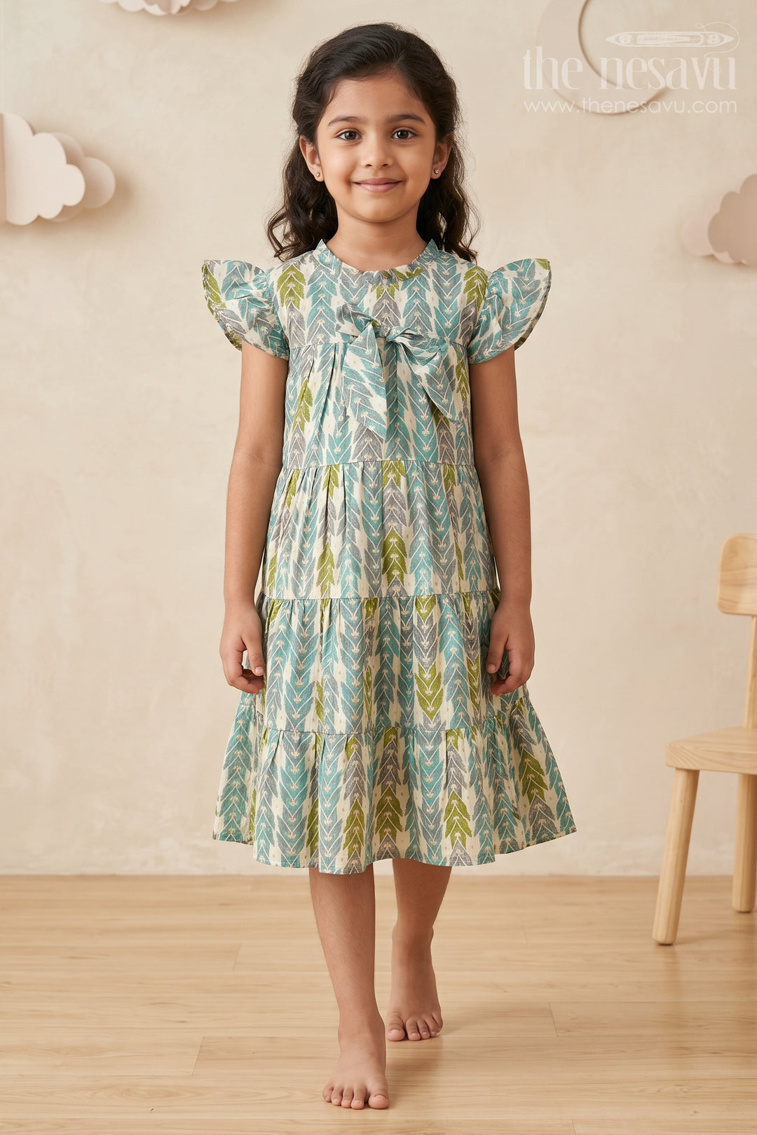 The Nesavu Girls Cotton Frock Green Colour Frock for Girls in Modal Silk with Multicolor Geometric Print and Front Bow Design Nesavu 18 (2Y) / Green GFC1696B-18 Green Colour Frock Girls Modal Silk Multicolor Geometric Print Front Bow | The Nesavu