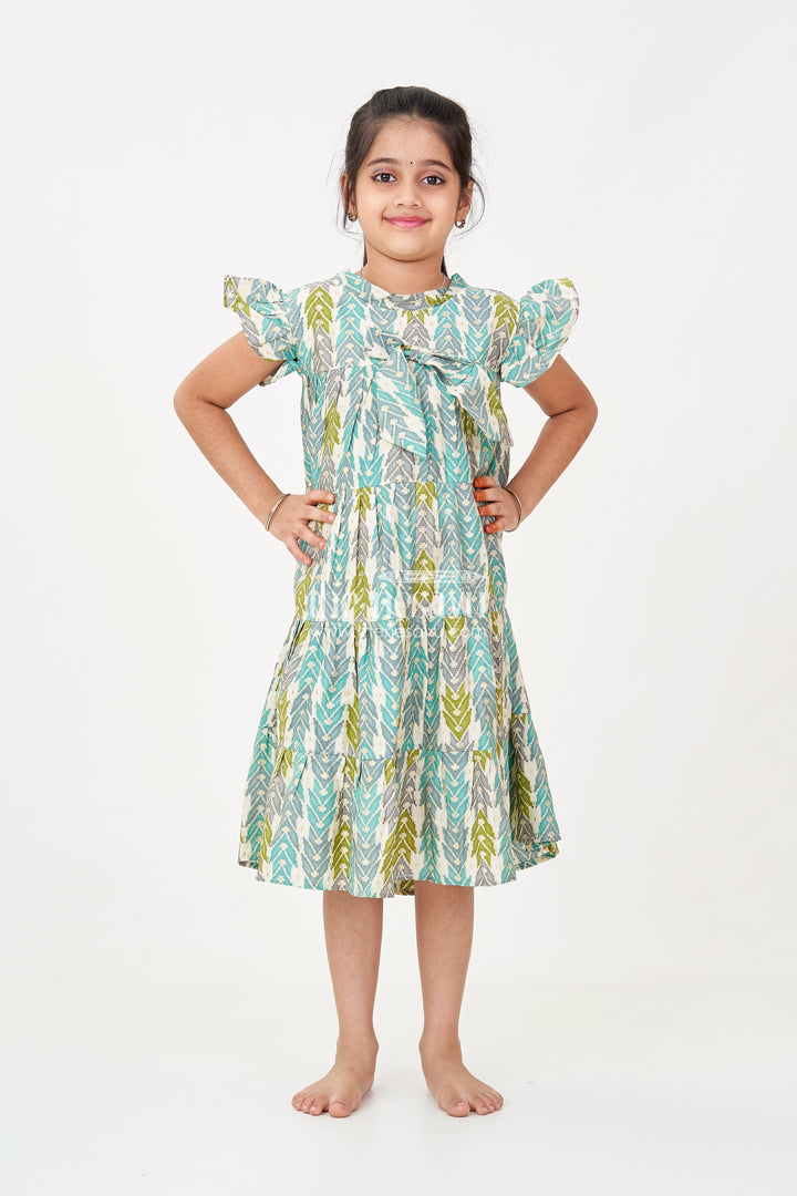The Nesavu Girls Cotton Frock Green Colour Frock for Girls in Modal Silk with Multicolor Geometric Print and Front Bow Design Nesavu 18 (2Y) / Green GFC1696B-18 Nesavu Green Colour Frock Girls Modal Silk Multicolor Geometric Print Front Bow