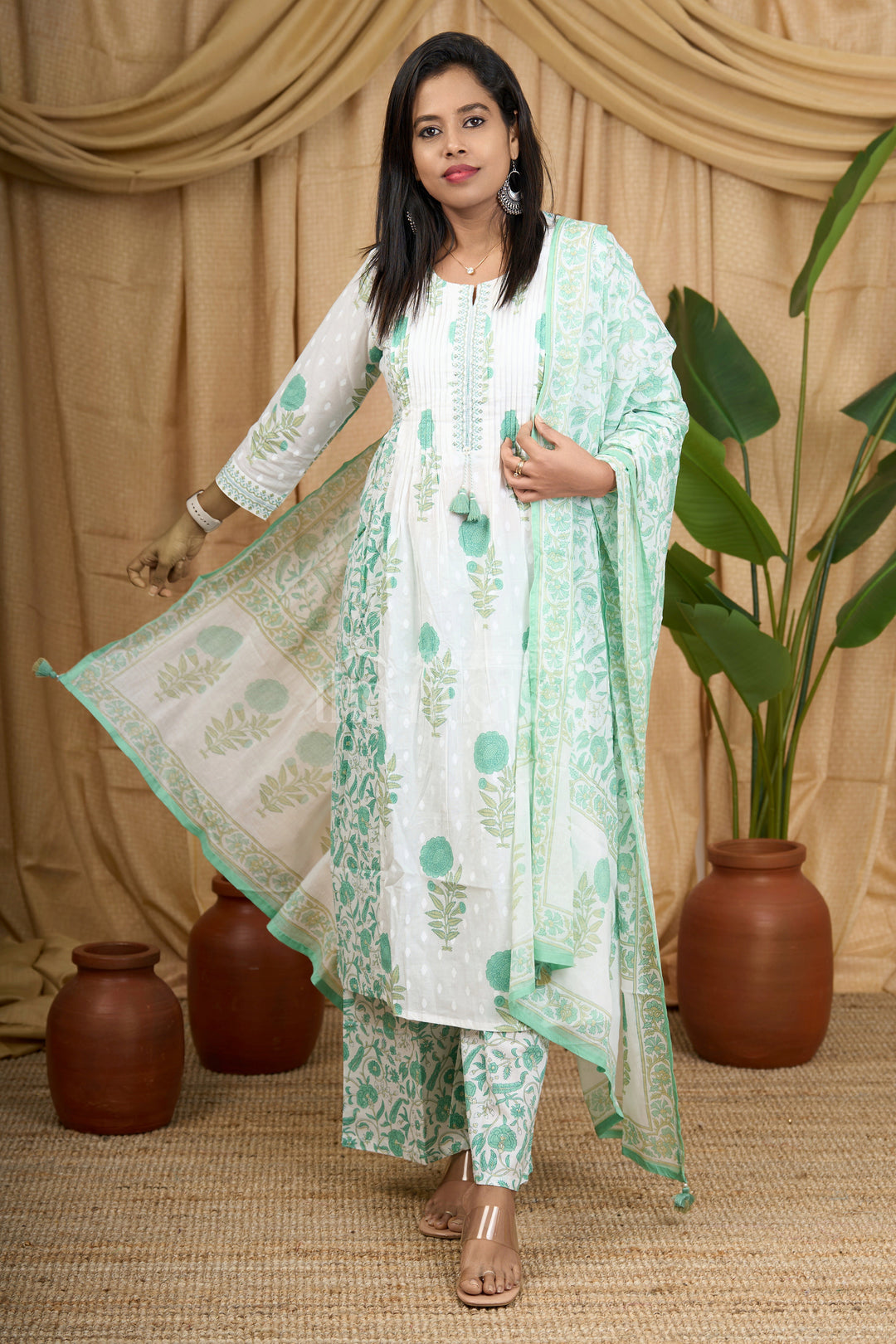 The Nesavu Womens Flared Suit Sets Green Jaipuri Cotton Kurti Set with Floral Patterns and Elegant Tassel Detailing for Women Nesavu Nesavu Green Jaipuri Cotton Kurti Set Floral Detailing Coordinated Bottom Women