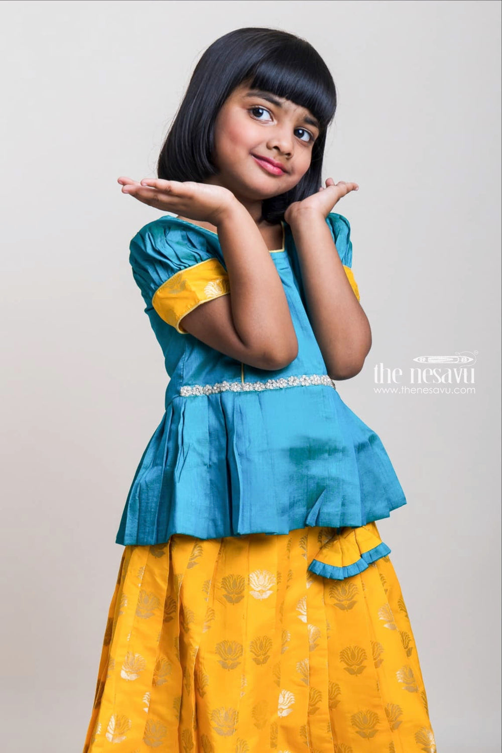 The Nesavu Pattu Pavadai Green Pleated Peplum Blouse And Brocade Printed Yellow Silk Skirt For Girls Nesavu Green And Yellow Pattu Pavadai| Festive Wear Collection 2023| The Nesavu