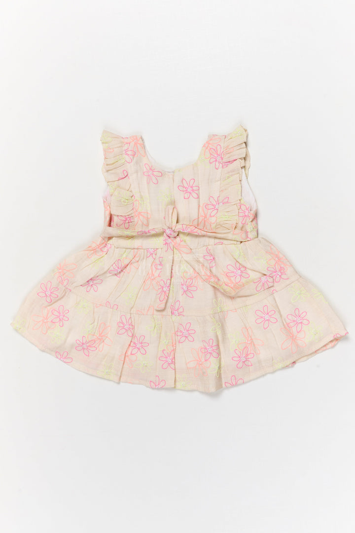 The Nesavu Baby Cotton Frocks Half White Baby Cotton Frock with Colorful Floral Embroidery and Bow Nesavu Nesavu half white baby frock with floral embroidery and ruffle sleeves