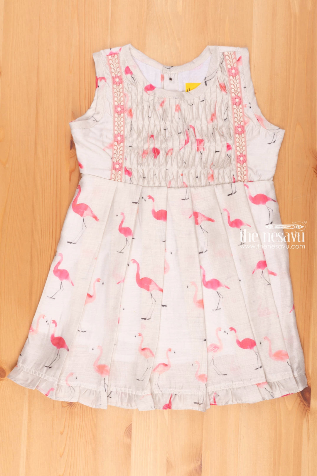 The Nesavu Girls Fancy Frock Half White Flamingo Fancy: Sleeveless Cotton Frock for Girls Nesavu 16 (1Y) / Half white / Cotton Blend GFC1139A-16 Printed Cotton Frock for Girls | Casual Gown and Frocks for Girls | the Nesavu