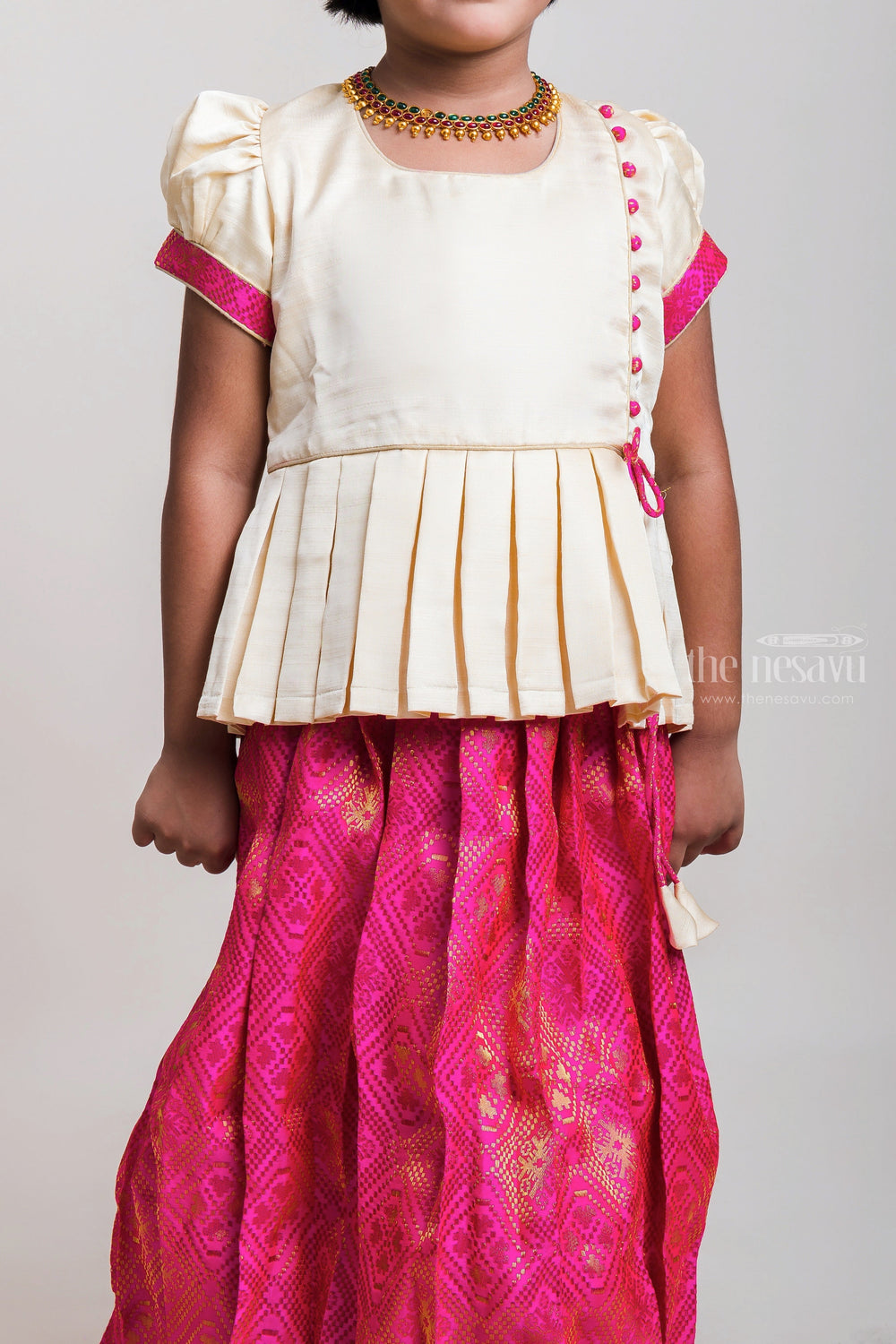 The Nesavu Pattu Pavadai Half-White Silk Blouse With Tassel And Pink Pavadai For Girls Nesavu White And Pink Pattu Pavada Dresses| Festive Wear Collection| The Nesavu