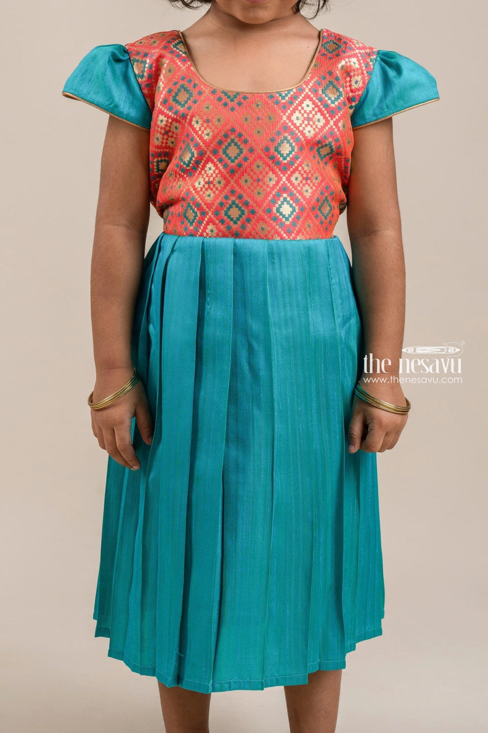 The Nesavu Silk Frock Ikat Designer Orange Yoke And Knife Pleated Blue Silk Frock For Girls Nesavu latest Silk Frock Collection For Girls | Girls Ethnic Wear | The Nesavu