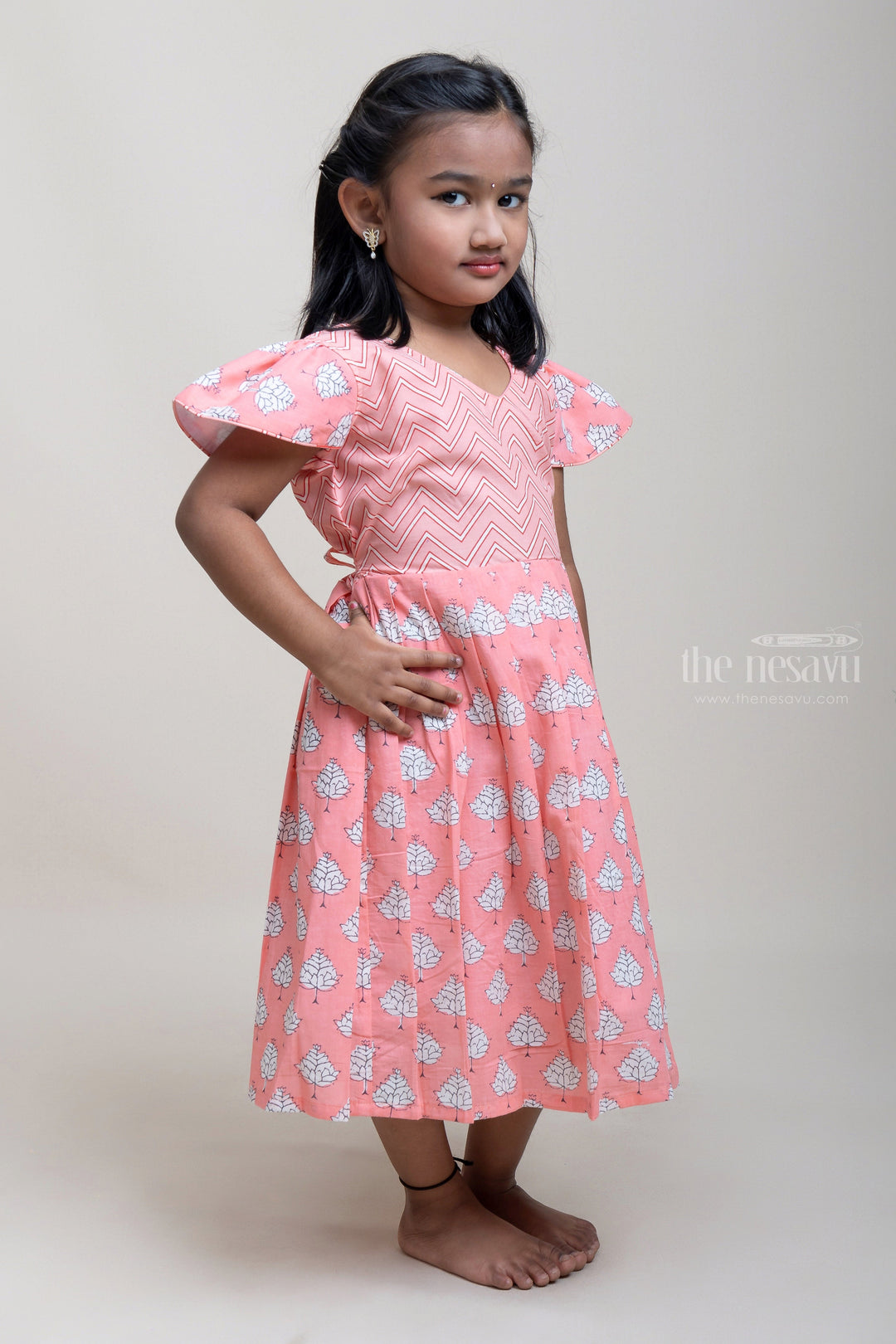 The Nesavu Girls Cotton Frock Ikkat Printed Yoke With Leaf Printed Pink Cotton Frock psr silks Nesavu