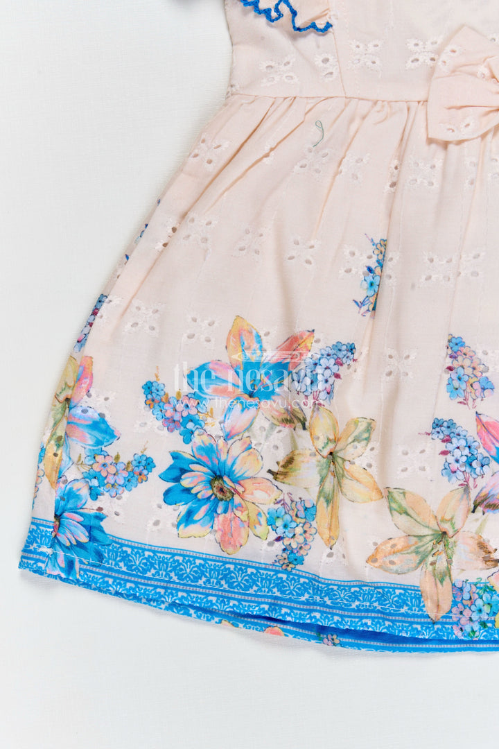 The Nesavu Baby Cotton Frocks Infant Occasion Dress for Baby Girl in Cream Hakoba Cotton with Blue Floral Hem and Ruffled Sleeves Nesavu Nesavu Infant Occasion Cotton Frock Baby Girl Blue Floral Print Ruffle Sleeves Hakoba Fabric