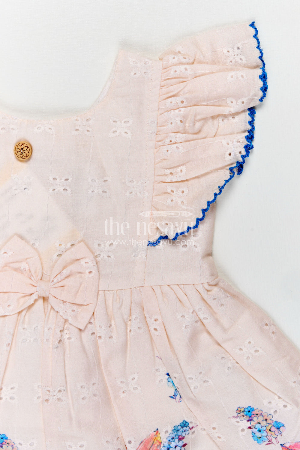 The Nesavu Baby Cotton Frocks Infant Occasion Dress for Baby Girl in Cream Hakoba Cotton with Blue Floral Hem and Ruffled Sleeves Nesavu Nesavu Infant Occasion Cotton Frock Baby Girl Blue Floral Print Ruffle Sleeves Hakoba Fabric