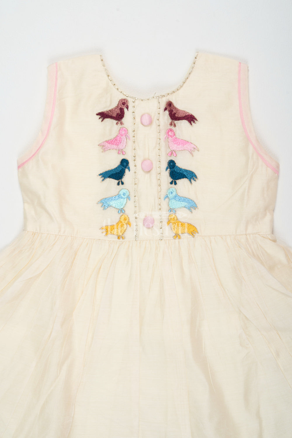 The Nesavu Girls Cotton Frock Ivory Chanderi Cotton Frock for Girls with Colorful Bird Embroidery and Pink Trim Nesavu Nesavu Girls Ivory Chanderi Cotton Frock Bird Embroidery Pink Hem Trim
