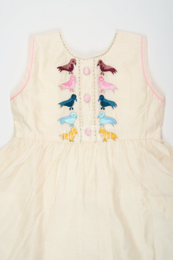 The Nesavu Girls Cotton Frock Ivory Chanderi Cotton Frock for Girls with Colorful Bird Embroidery and Pink Trim Nesavu Nesavu Girls Ivory Chanderi Cotton Frock Bird Embroidery Pink Hem Trim