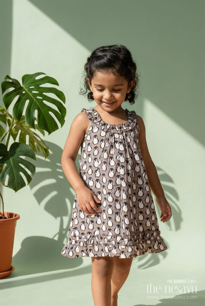 The Nesavu Girls Cotton Frock Kids Casual Cotton Printed Frock for Girls with Brown Penguin Block Print and Frilled Shoulders Nesavu 18 (2Y) / Black GFC1796B-18 Nesavu Brown Hand Block Kids Casual Cotton Printed Frock Penguin Motifs Ruffled Design