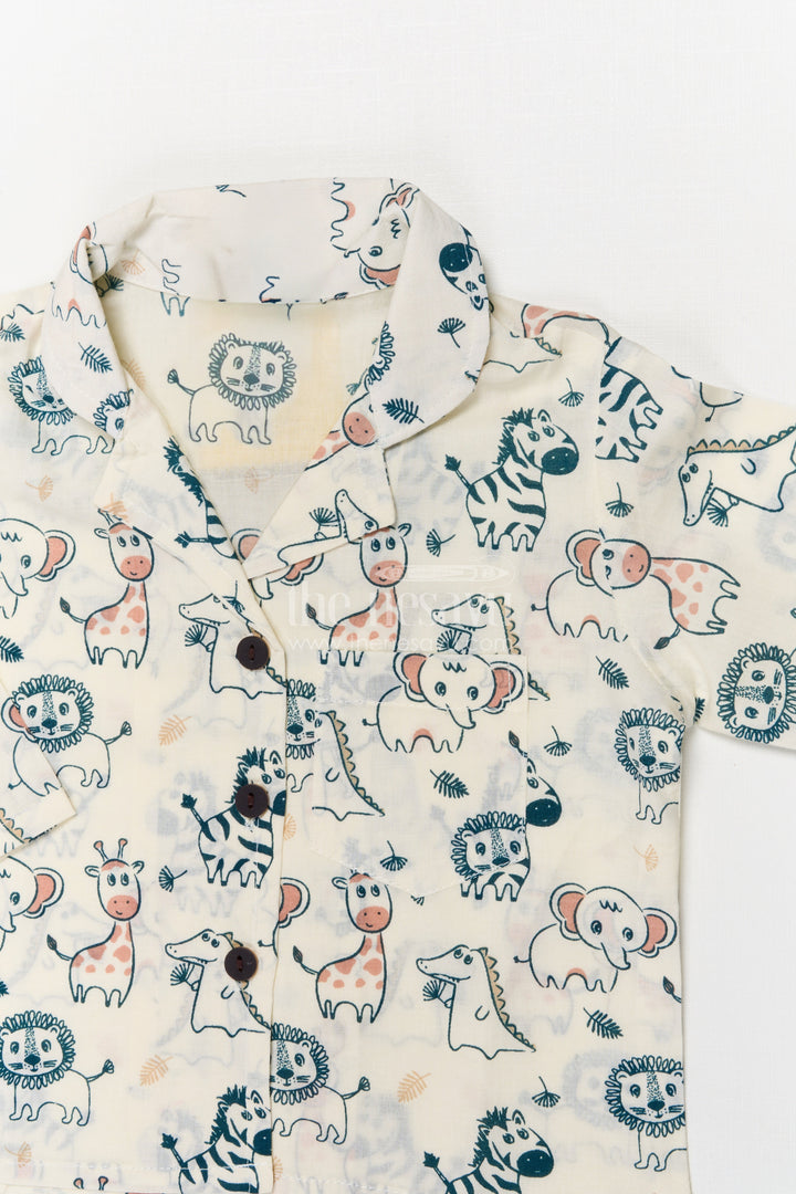 The Nesavu Night Dress Kids Cotton Nightwear with Jungle Animal Print for Cozy Sleep Nesavu Nesavu cotton nightwear set for kids with animal print – soft, breathable jungle-themed sleepwear