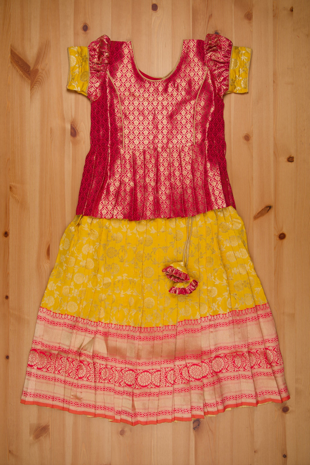 The Nesavu Pattu Pavadai Langa Brocade Peplum Blouse paired with Banarasi Pattu Pavadai Chattai - Traditional Silk Dress for Girls Nesavu 14 (6M) / Yellow / Silk Blend GPP310B-14 Traditional Girls Pavadai Sattai | Langa Voni Pattu Pavadai For Girls | The Nesavu