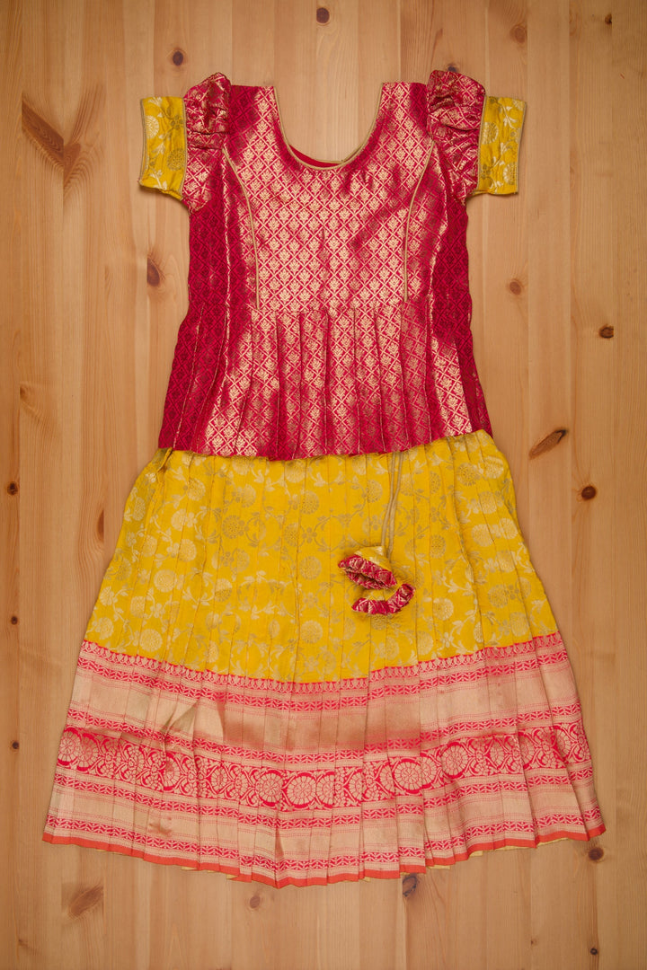 The Nesavu Pattu Pavadai Langa Brocade Peplum Blouse paired with Banarasi Pattu Pavadai Chattai - Traditional Silk Dress for Girls Nesavu 14 (6M) / Yellow / Silk Blend GPP310B-14 Traditional Girls Pavadai Sattai | Langa Voni Pattu Pavadai For Girls | The Nesavu