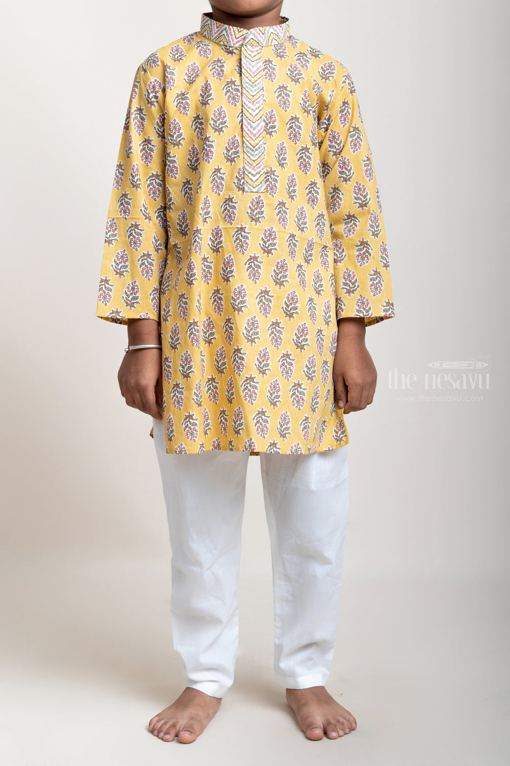 The Nesavu Boys Kurtha Set Latest Floral Printed And Designer Neck Yellow Cotton Kurta And Pyjama For Boys psr silks Nesavu