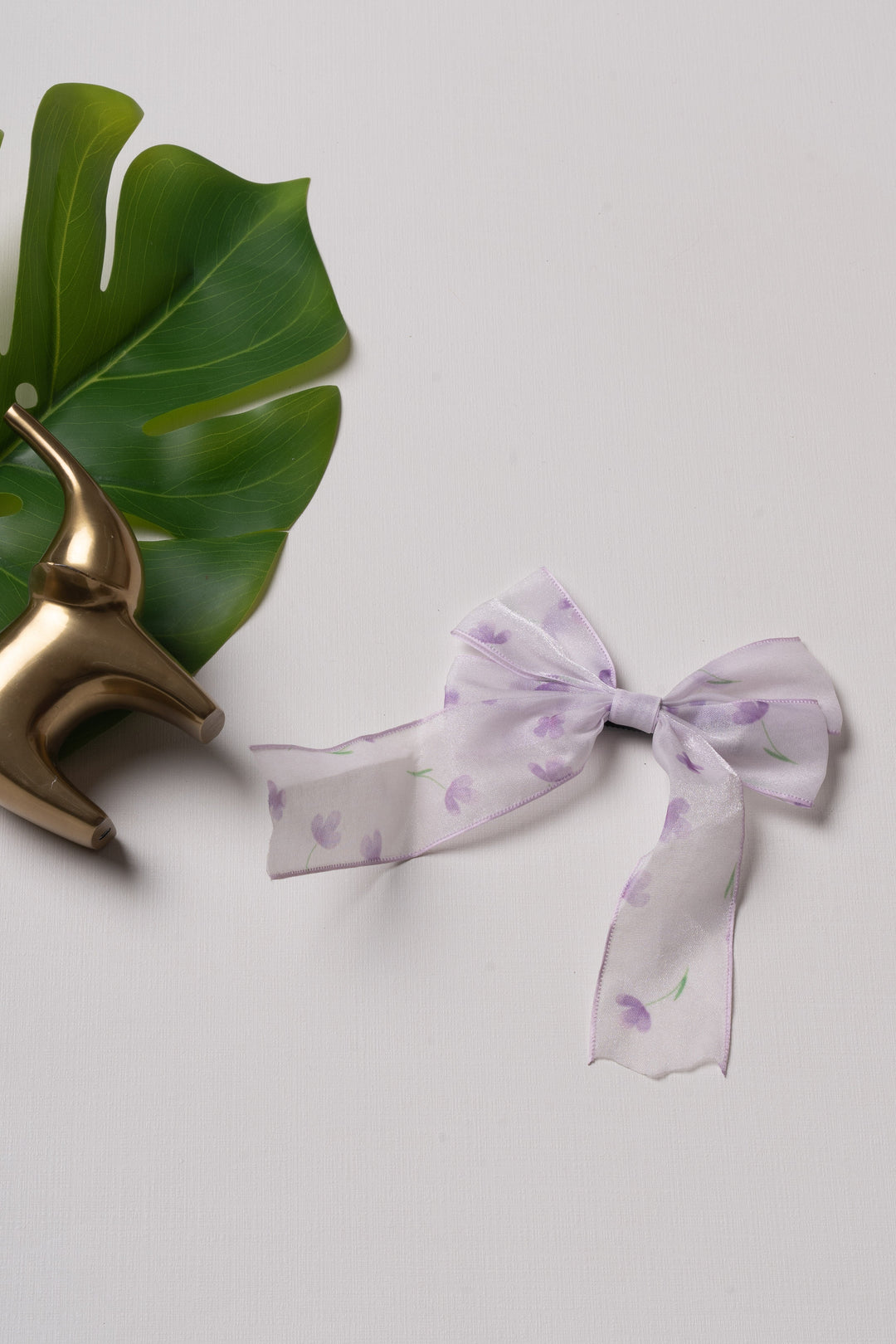 The Nesavu Hair Clip Lavender Whispers Bow Clip – A Delicate Touch for Her Locks Nesavu Purple JHCL71E Elegant Lavender Bow Hair Clip with Floral Print for Girls | The Nesavu