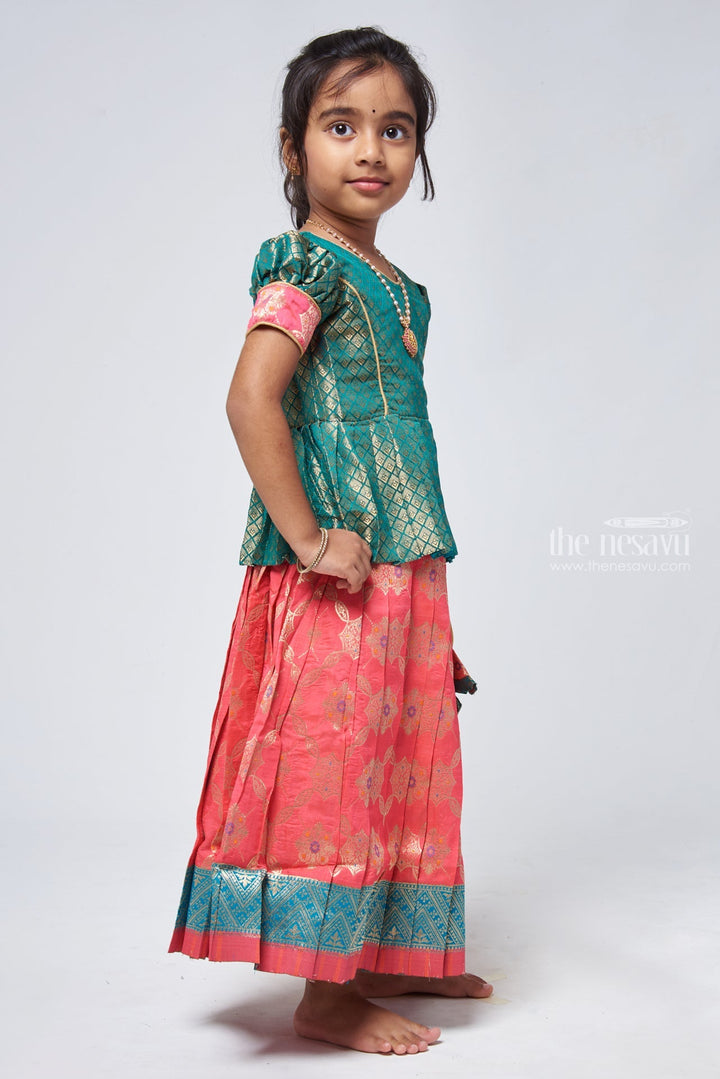 The Nesavu Pattu Pavadai Lavish Brocade Peplum Green Blouse with Zari Banarasi Pink Skirt: Classic Silk Beauty for Girls Nesavu Zari Banarasi Pavadai chattai | Designer Pattu Pavadai | The Nesavu