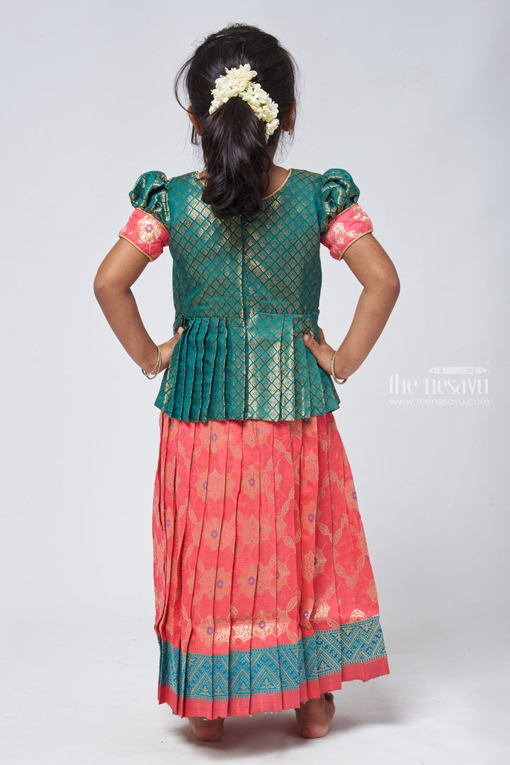 The Nesavu Pattu Pavadai Lavish Brocade Peplum Green Blouse with Zari Banarasi Pink Skirt: Classic Silk Beauty for Girls Nesavu Zari Banarasi Pavadai chattai | Designer Pattu Pavadai | The Nesavu