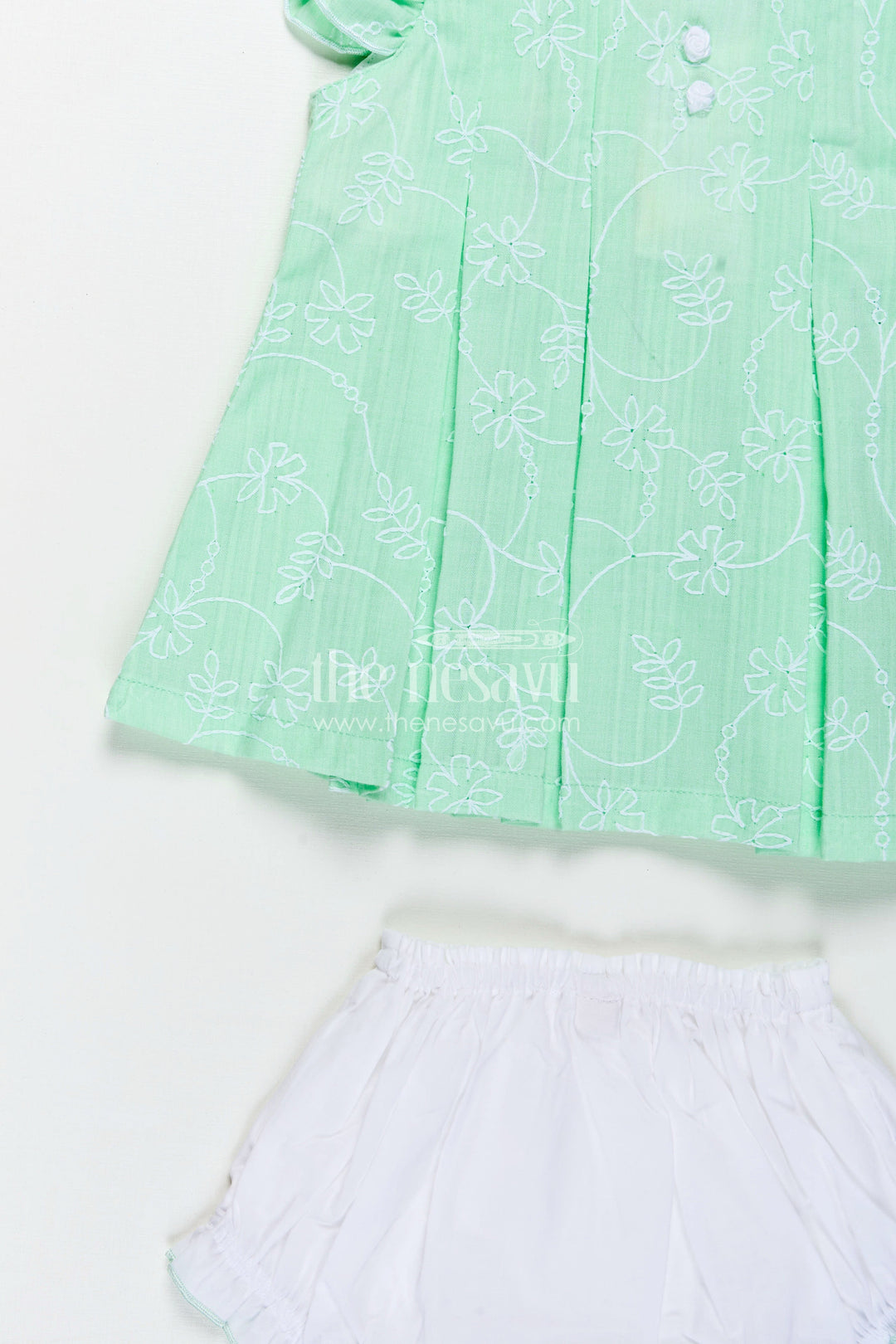 The Nesavu Baby Cotton Frocks Light Pink Frocks for Babies in Green Embroidered Cotton with Frilled Sleeves and Matching Bloomers Nesavu Nesavu Light Pink Frocks Green Cotton Thread Embroidery Ruffled Bloomers Babies