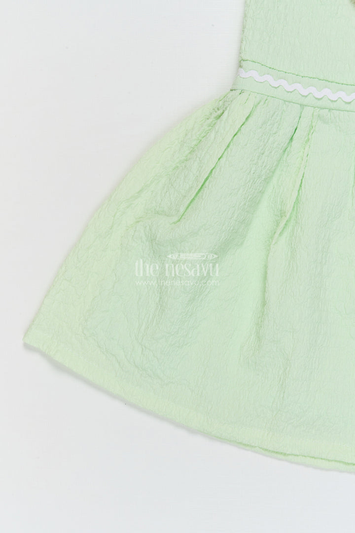 The Nesavu Girls Cotton Frock Lightweight Cotton Frock for Baby Girls' Everyday Moments Nesavu Nesavu seersucker baby frock with pastel flower detail and puff sleeves for everyday comfort