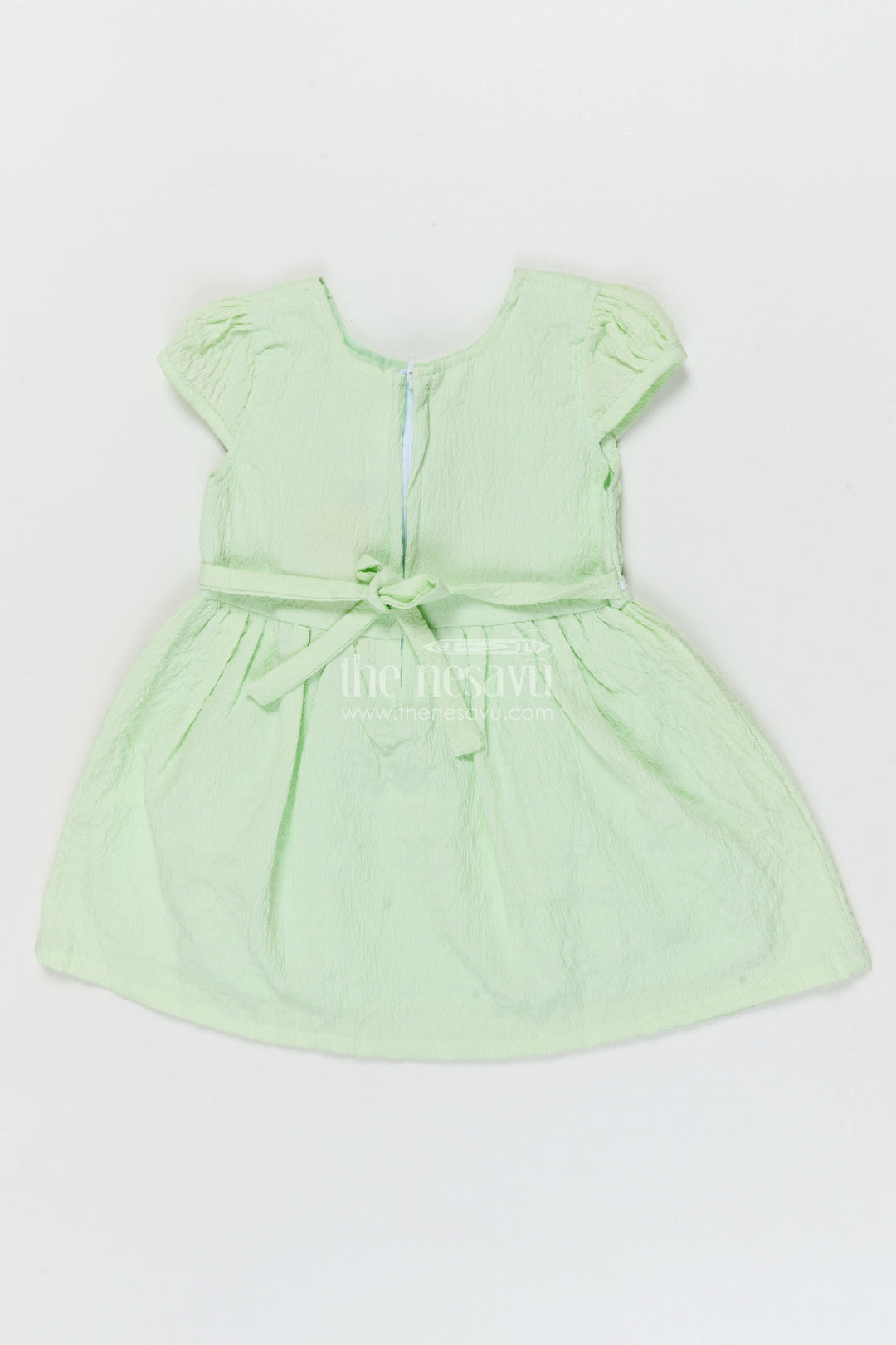 The Nesavu Girls Cotton Frock Lightweight Cotton Frock for Baby Girls' Everyday Moments Nesavu Nesavu seersucker baby frock with pastel flower detail and puff sleeves for everyday comfort