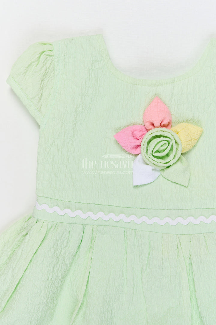 The Nesavu Girls Cotton Frock Lightweight Cotton Frock for Baby Girls' Everyday Moments Nesavu Nesavu seersucker baby frock with pastel flower detail and puff sleeves for everyday comfort