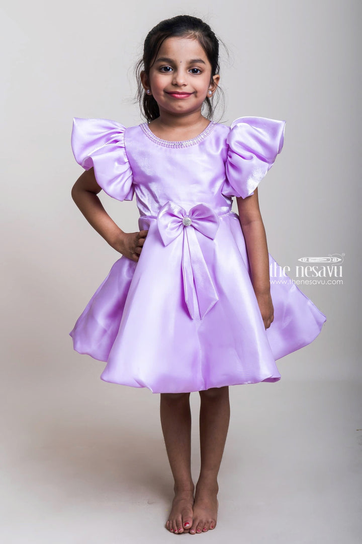 The Nesavu Girls Fancy Party Frock Lustrous Lavender Silk Satin Frocks With Bow Embellishment For Girls Nesavu 16 (1Y) / Purple PF104A-16 Glaze Silk Satin Frocks Collection| Trending Designs| The Nesavu