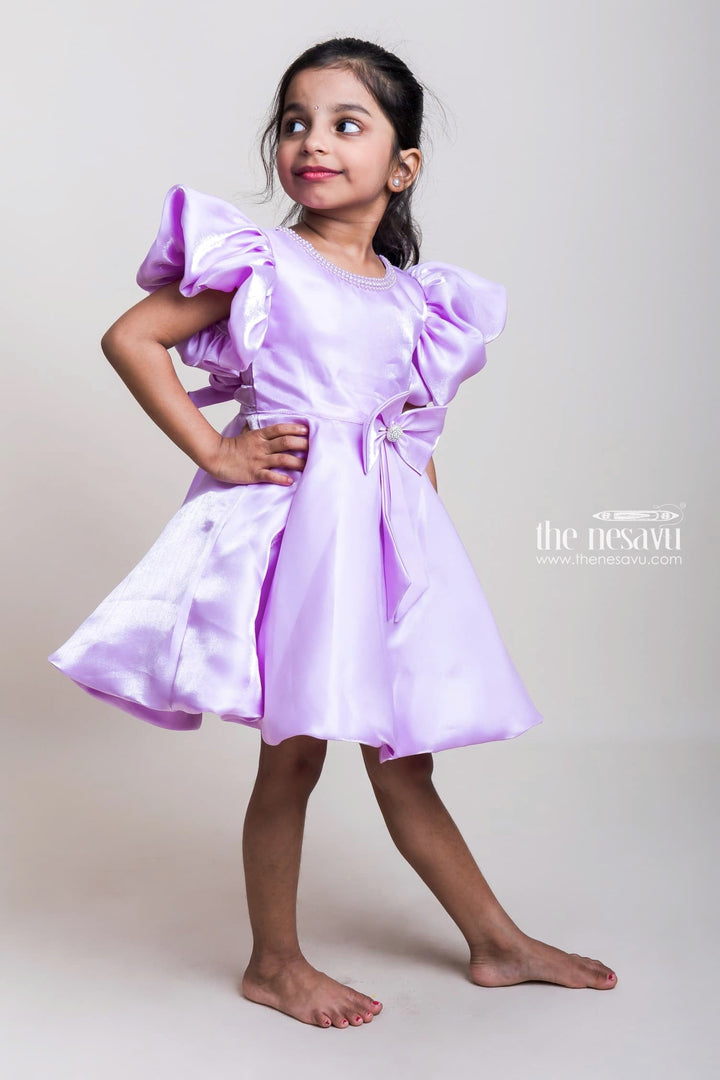 The Nesavu Girls Fancy Party Frock Lustrous Lavender Silk Satin Frocks With Bow Embellishment For Girls Nesavu Glaze Silk Satin Frocks Collection| Trending Designs| The Nesavu