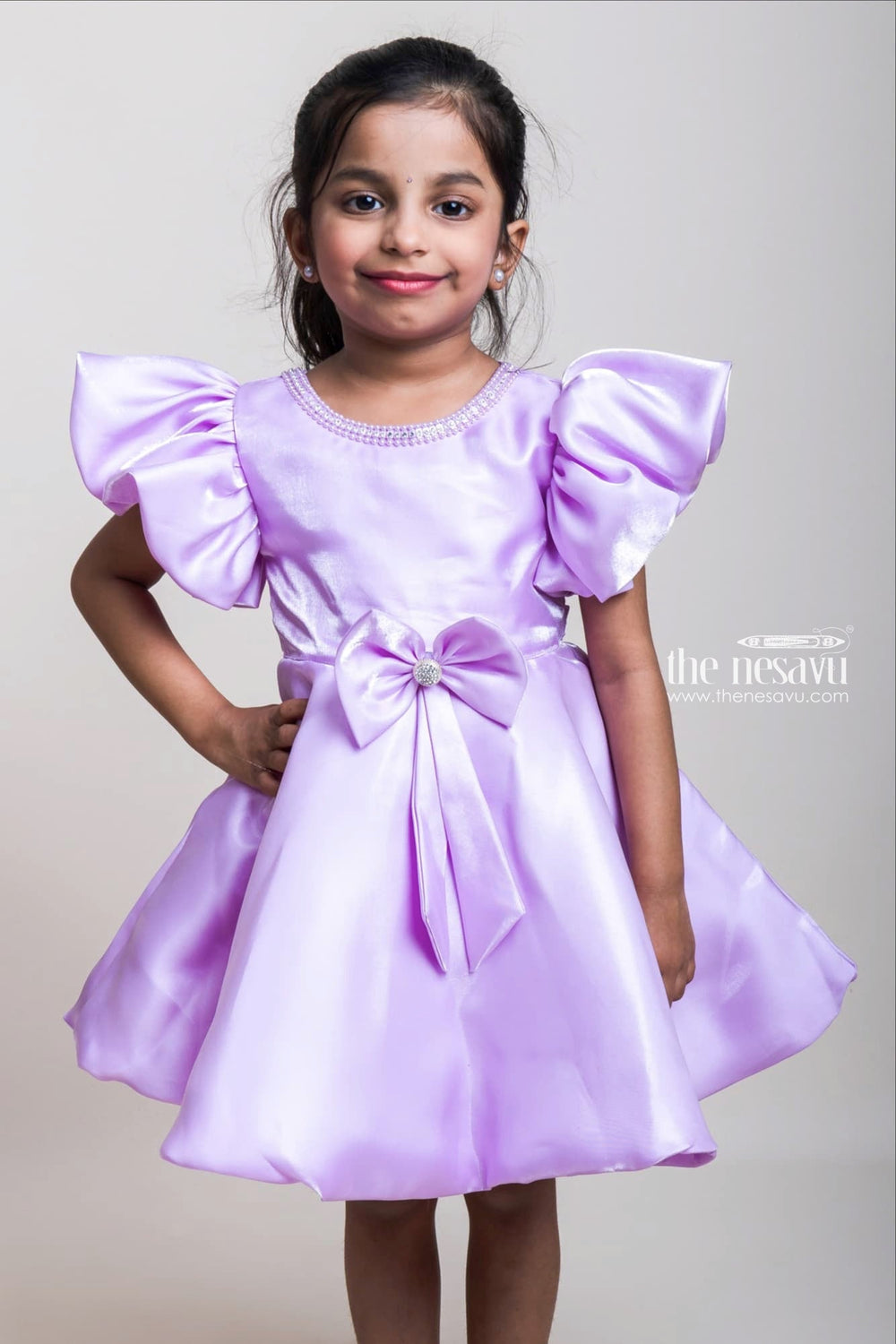 The Nesavu Girls Fancy Party Frock Lustrous Lavender Silk Satin Frocks With Bow Embellishment For Girls Nesavu Glaze Silk Satin Frocks Collection| Trending Designs| The Nesavu