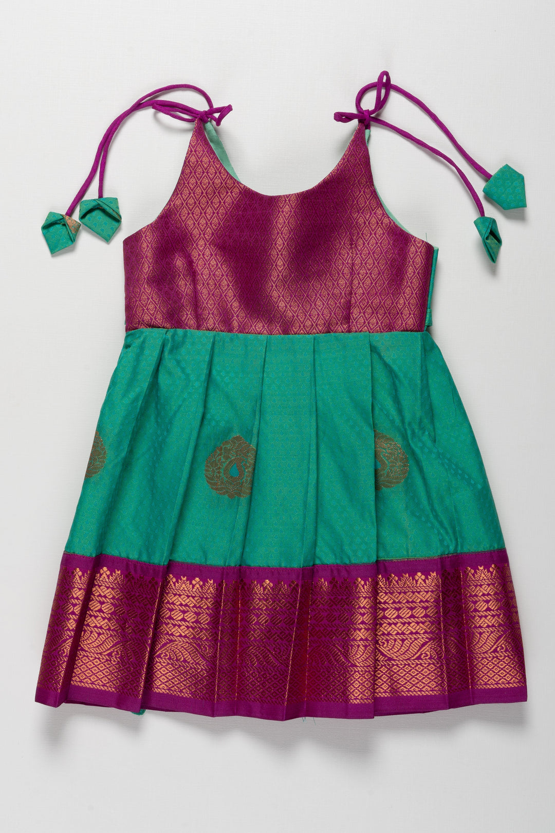 The Nesavu Tie-up Frock Majestic Peacock Silk Tie-Up Frock: A Fusion of Splendor for Annaprasana and Vidyarambham Nesavu 14 (6M) / Green / Style 4 T372D-14 Shop Elegant Silk TieUp Frocks for Girls | Floral Print Silk Dresses Online | The Nesavu