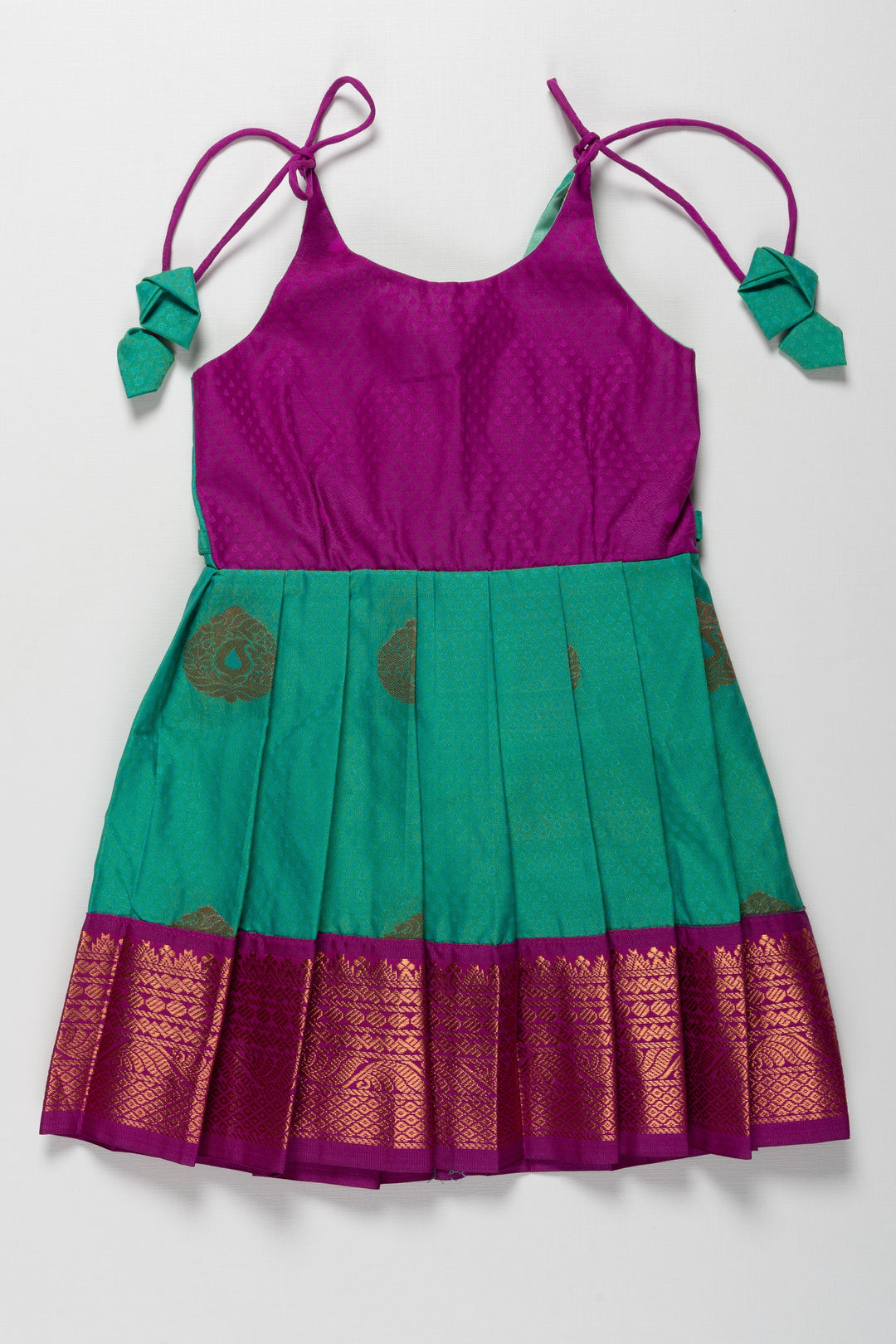 The Nesavu Tie-up Frock Majestic Peacock Silk Tie-Up Frock: A Fusion of Splendor for Annaprasana and Vidyarambham Nesavu 16 (1Y) / Green / Style 6 T372F-16 Shop Elegant Silk TieUp Frocks for Girls | Floral Print Silk Dresses Online | The Nesavu