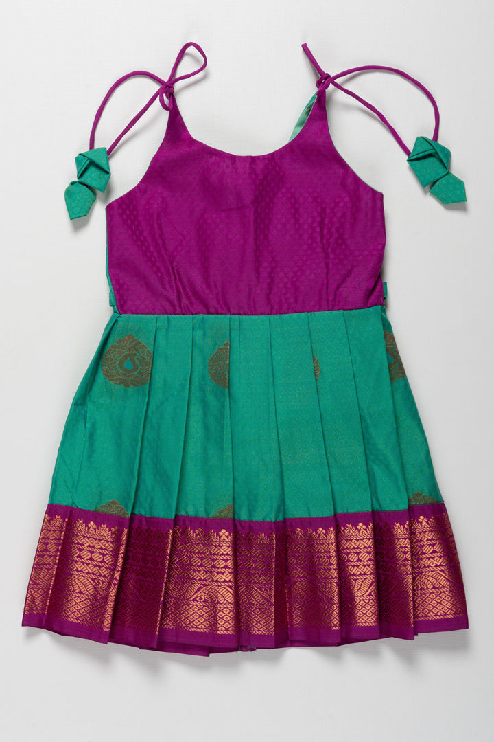 The Nesavu Tie-up Frock Majestic Peacock Silk Tie-Up Frock: A Fusion of Splendor for Annaprasana and Vidyarambham Nesavu 16 (1Y) / Green / Style 6 T372F-16 Shop Elegant Silk TieUp Frocks for Girls | Floral Print Silk Dresses Online | The Nesavu