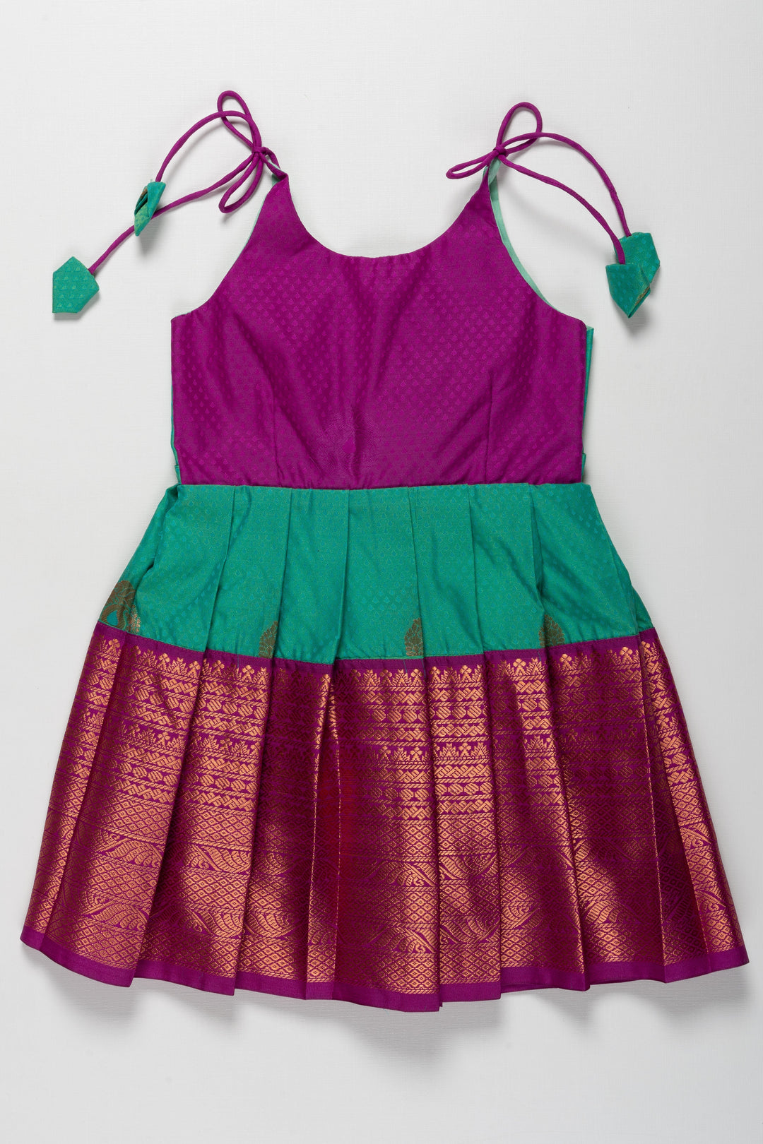 The Nesavu Tie-up Frock Majestic Peacock Silk Tie-Up Frock: A Fusion of Splendor for Annaprasana and Vidyarambham Nesavu 18 (2Y) / Green / Style 3 T372C-18 Shop Elegant Silk TieUp Frocks for Girls | Floral Print Silk Dresses Online | The Nesavu