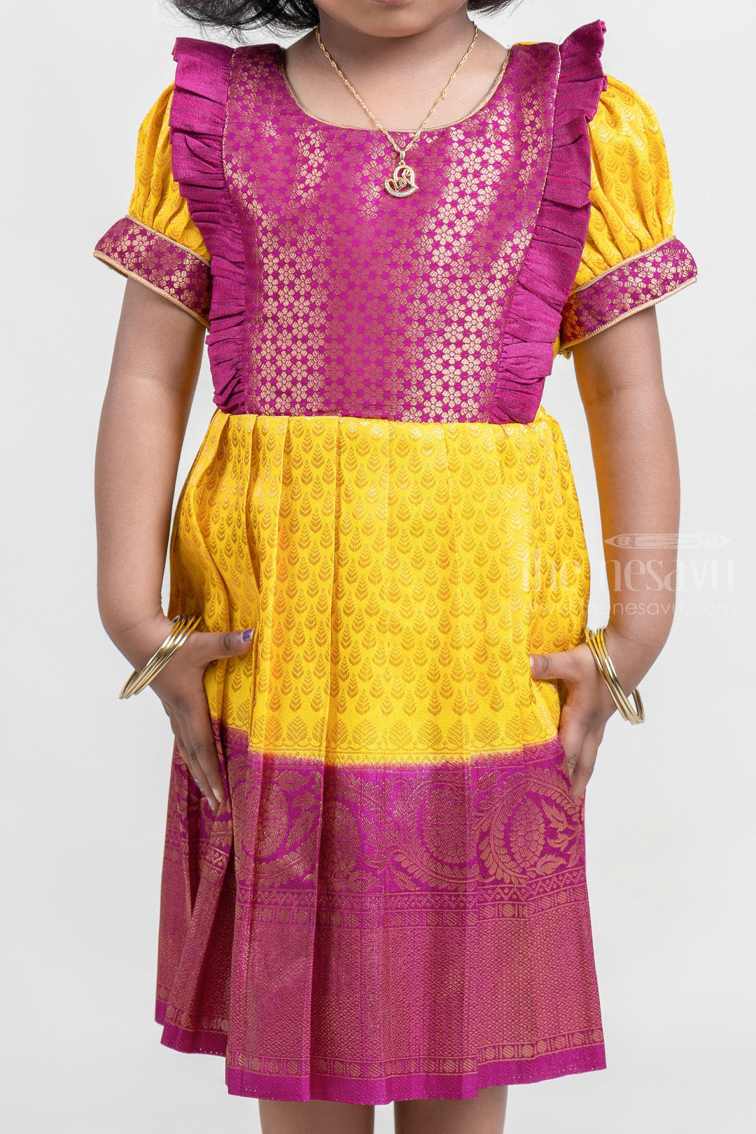 The Nesavu Girls Kanchi Silk Frock Mango Yellow with Deep Purple Semi Banarasi Silk / Pattu Frock For Kids Girls Nesavu Floral Purple and Yellow Semi-Silk Frock for Girls | Zari with Floral Brocade Designer Purple Yoke | The Nesavu