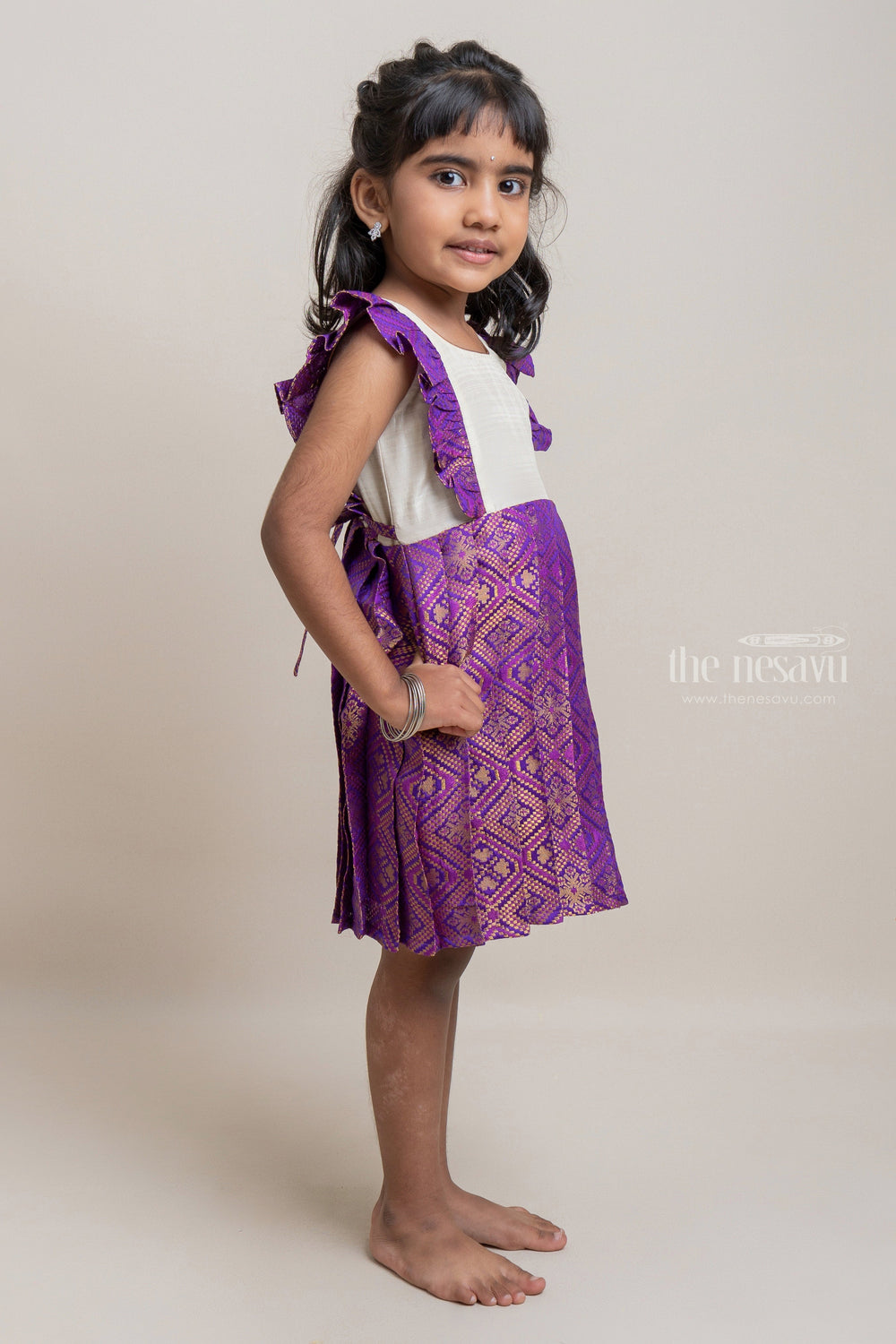 The Nesavu Silk Frock Mesmerizing Purple Pleated Creation Classic Resham Radiance for Aspiring Divas. Nesavu Fantastic Semi-Silk Frock For Girls | Premium Pattu Frock | The Nesavu