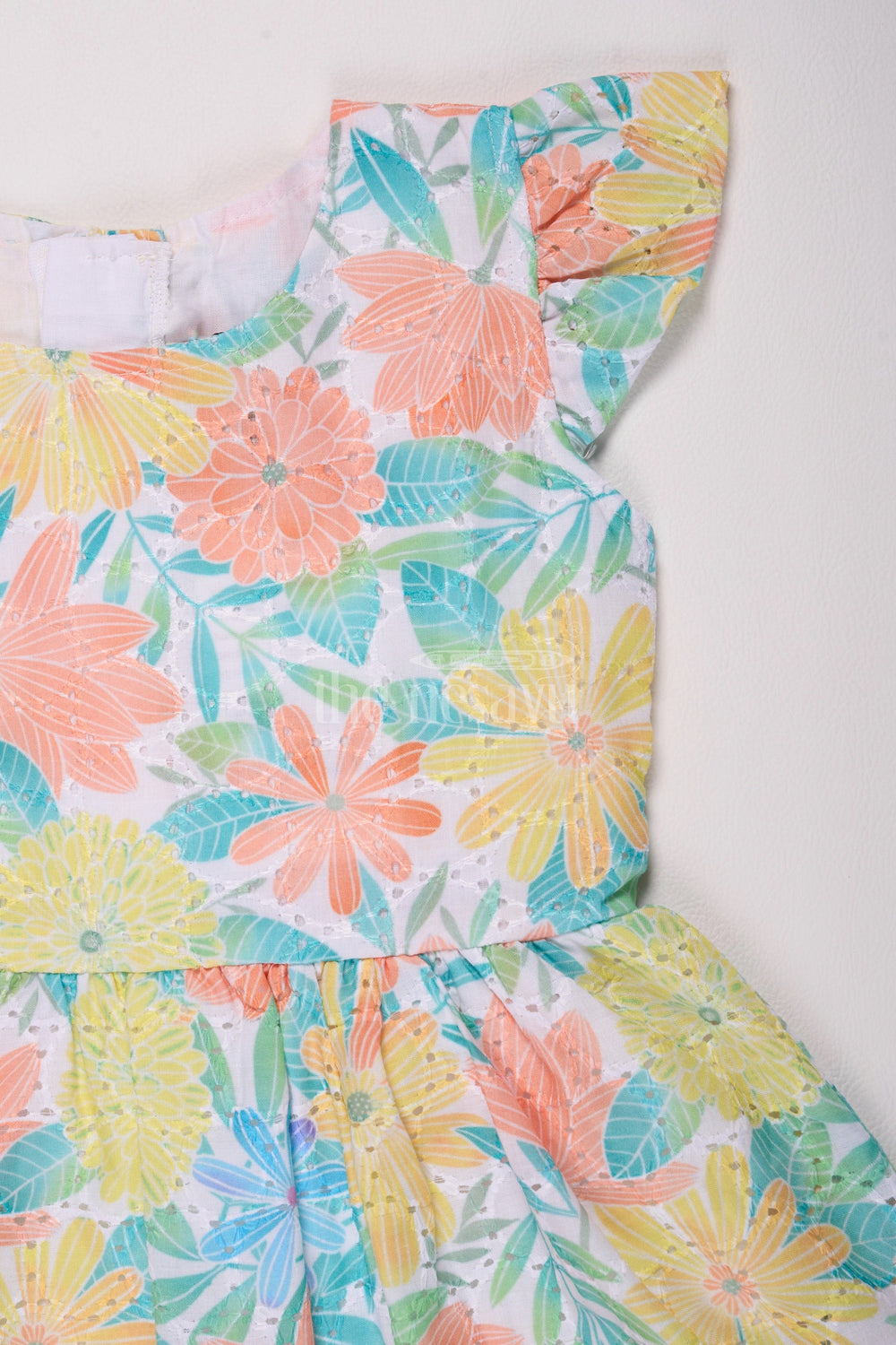 The Nesavu Girls Cotton Frock Multicolor Cotton Floral Frock with Flutter Sleeves for Girls, Perfect for Summer Outings Nesavu Nesavu Multicolor Girls Cotton Floral Frock Flutter Sleeves Summer Outings Picnics