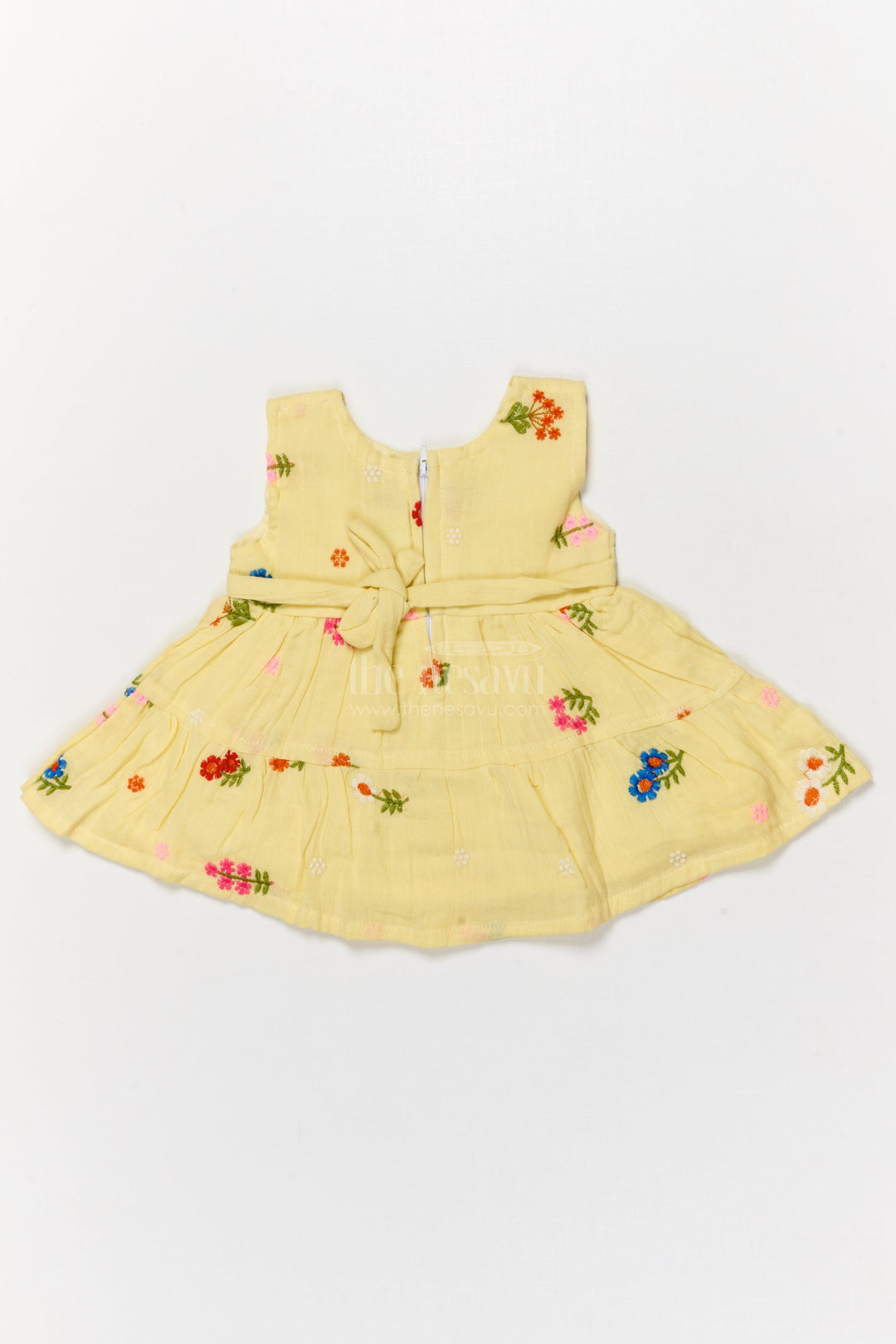 The Nesavu Baby Cotton Frocks Muslin Cotton Frock for Baby Girl's Summer Playdates and Casual Wear Nesavu 14 (6M) / Yellow / Cotton Blend BFJ910B-14 Nesavu muslin cotton frock with floral embroidery and butterfly patch for baby girl summer wear