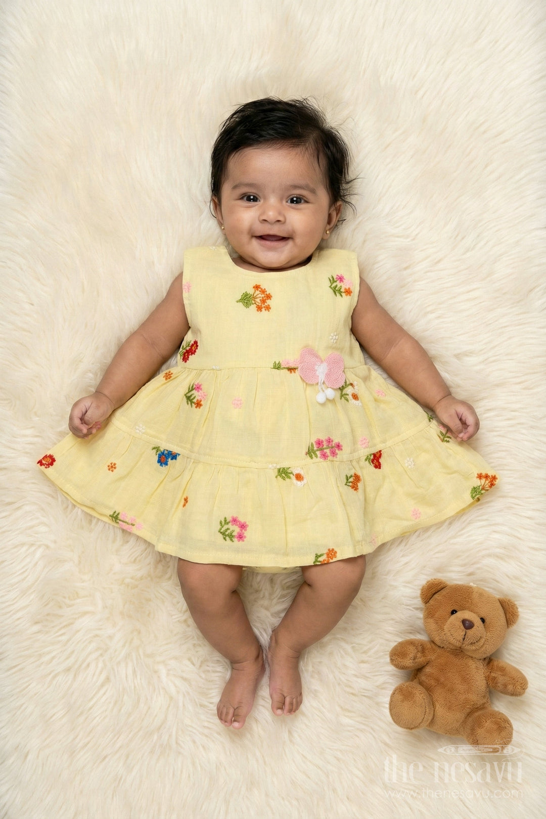 The Nesavu Baby Cotton Frocks Muslin Cotton Frock for Baby Girl's Summer Playdates and Casual Wear Nesavu 14 (6M) / Yellow / Cotton Blend BFJ910B-14 Nesavu muslin cotton frock with floral embroidery and butterfly patch for baby girl summer wear