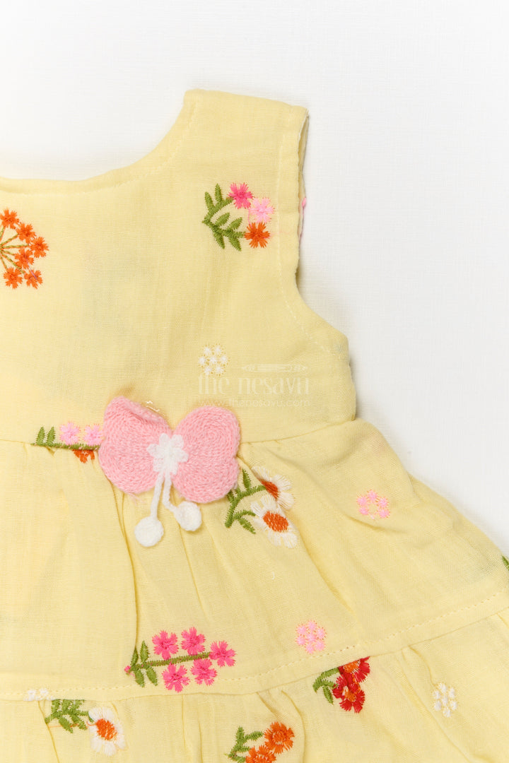 The Nesavu Baby Cotton Frocks Muslin Cotton Frock for Baby Girl's Summer Playdates and Casual Wear Nesavu Nesavu muslin cotton frock with floral embroidery and butterfly patch for baby girl summer wear