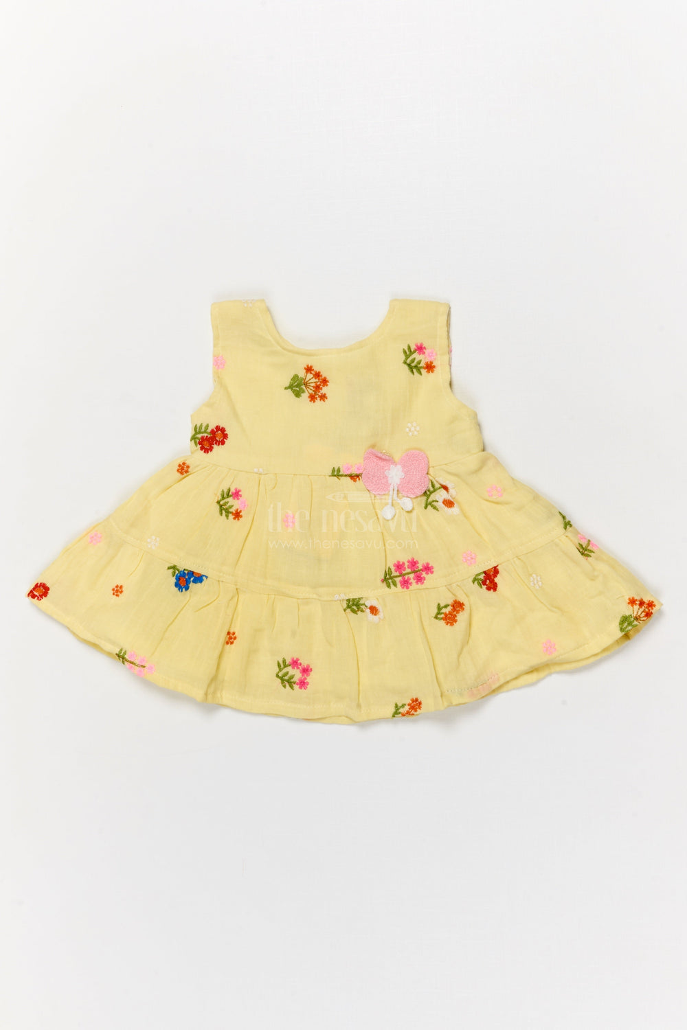 The Nesavu Baby Cotton Frocks Muslin Cotton Frock for Baby Girl's Summer Playdates and Casual Wear Nesavu Nesavu muslin cotton frock with floral embroidery and butterfly patch for baby girl summer wear