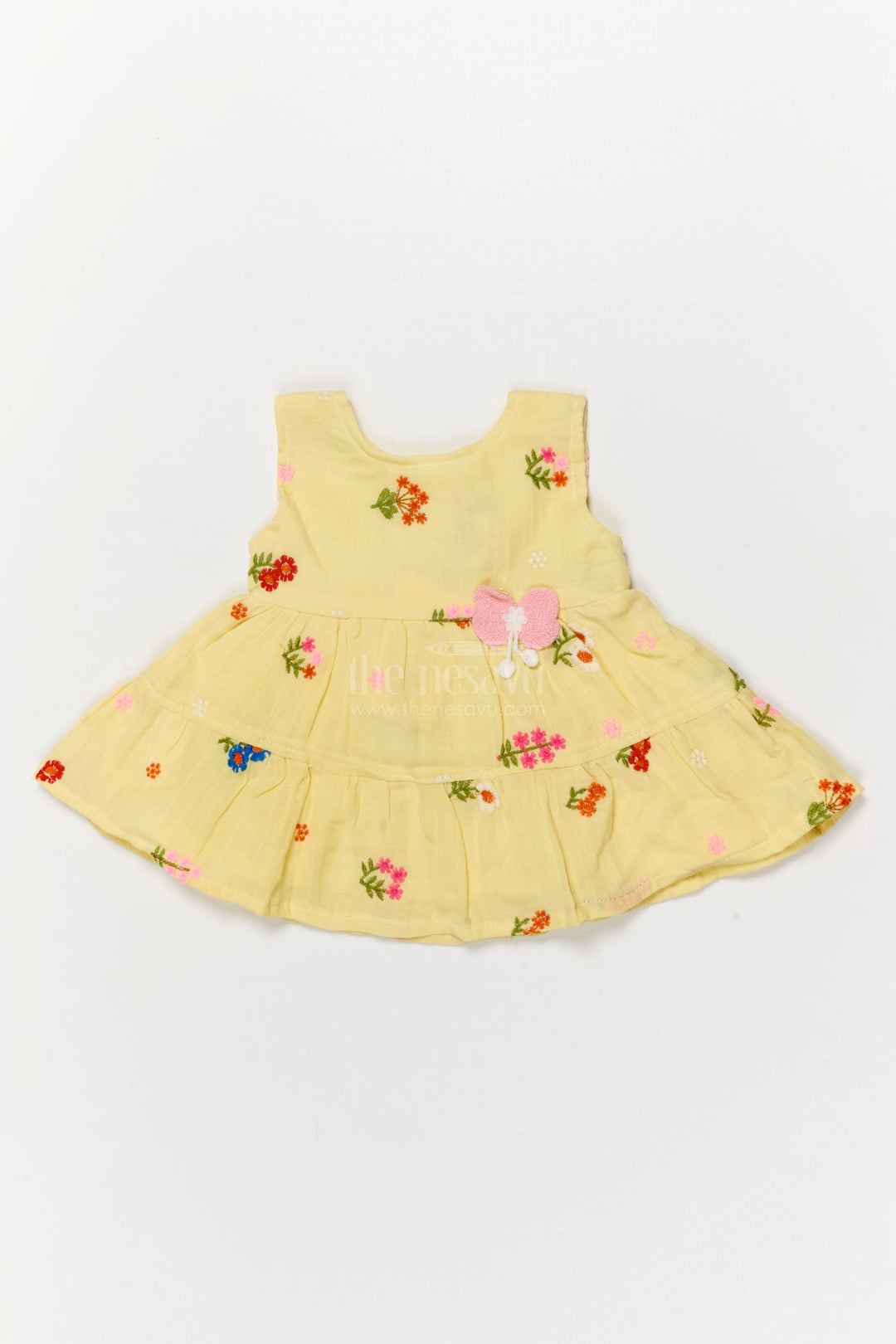 The Nesavu Baby Cotton Frocks Muslin Cotton Frock for Baby Girl's Summer Playdates and Casual Wear Nesavu Nesavu muslin cotton frock with floral embroidery and butterfly patch for baby girl summer wear
