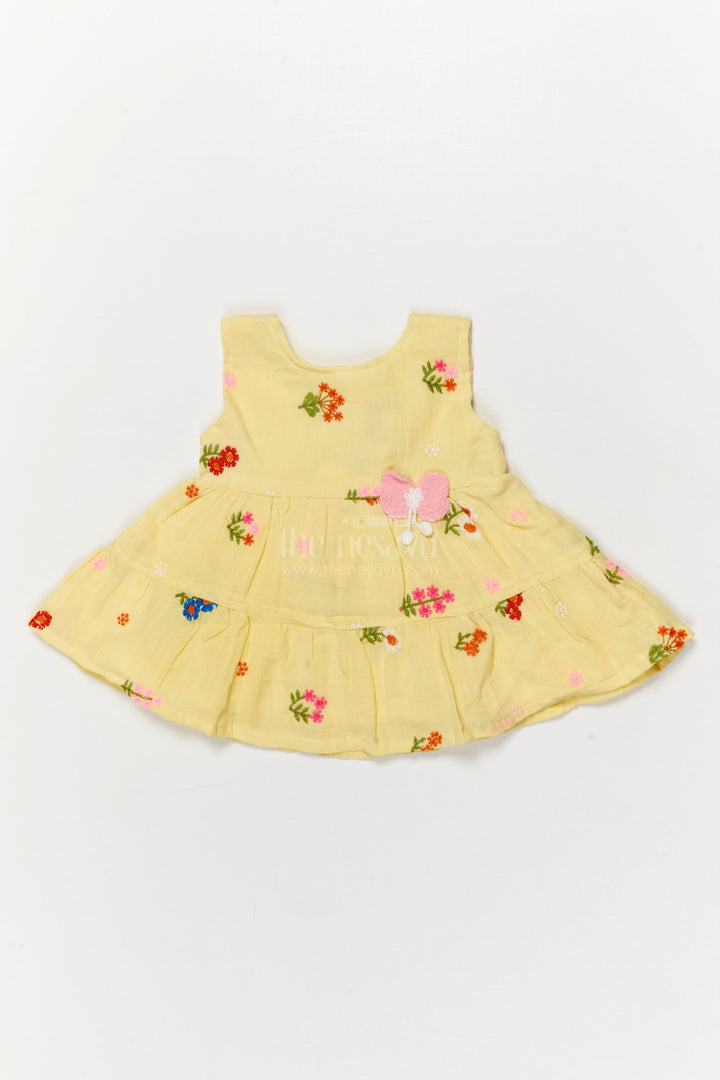 The Nesavu Baby Cotton Frocks Muslin Cotton Frock for Baby Girl's Summer Playdates and Casual Wear Nesavu Nesavu muslin cotton frock with floral embroidery and butterfly patch for baby girl summer wear