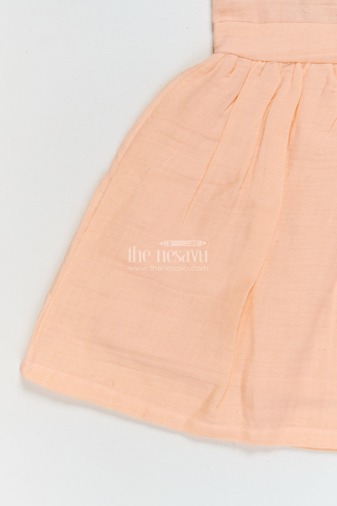 The Nesavu Girls Cotton Frock Muslin Cotton Frock for Baby Girls’ Everyday Comfort Nesavu Nesavu muslin cotton baby frock for everyday wear with ruffle sleeves and floral applique