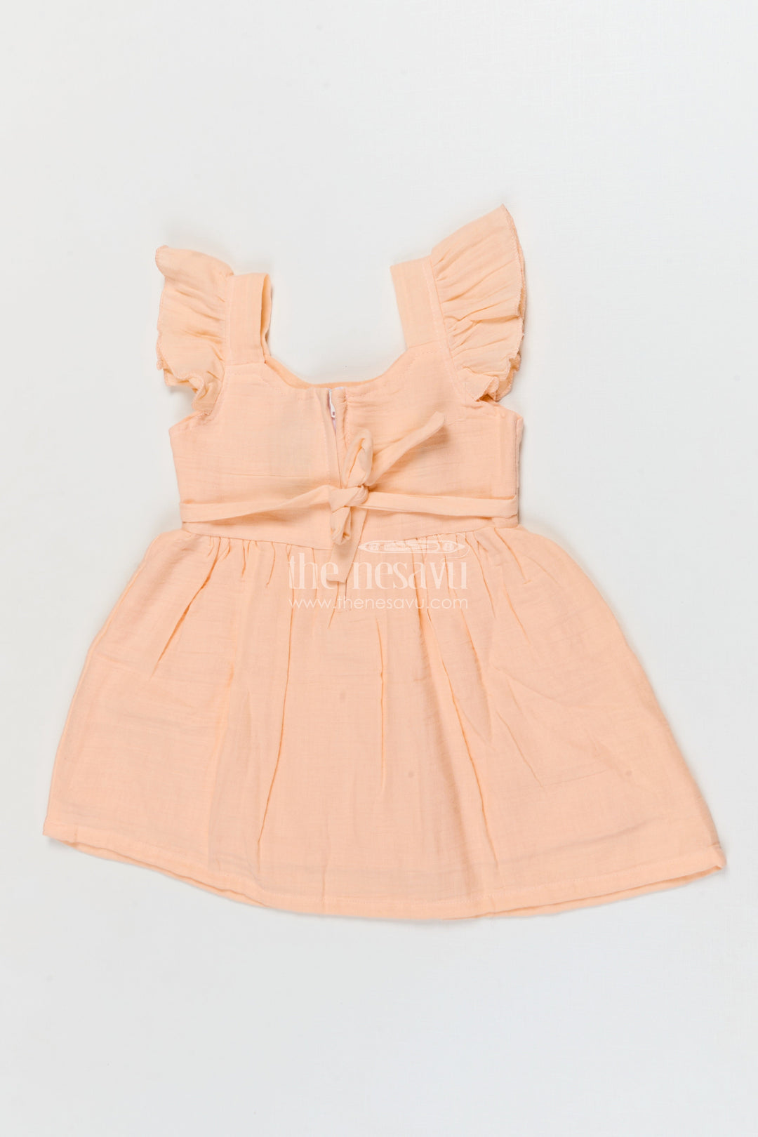 The Nesavu Girls Cotton Frock Muslin Cotton Frock for Baby Girls’ Everyday Comfort Nesavu Nesavu muslin cotton baby frock for everyday wear with ruffle sleeves and floral applique