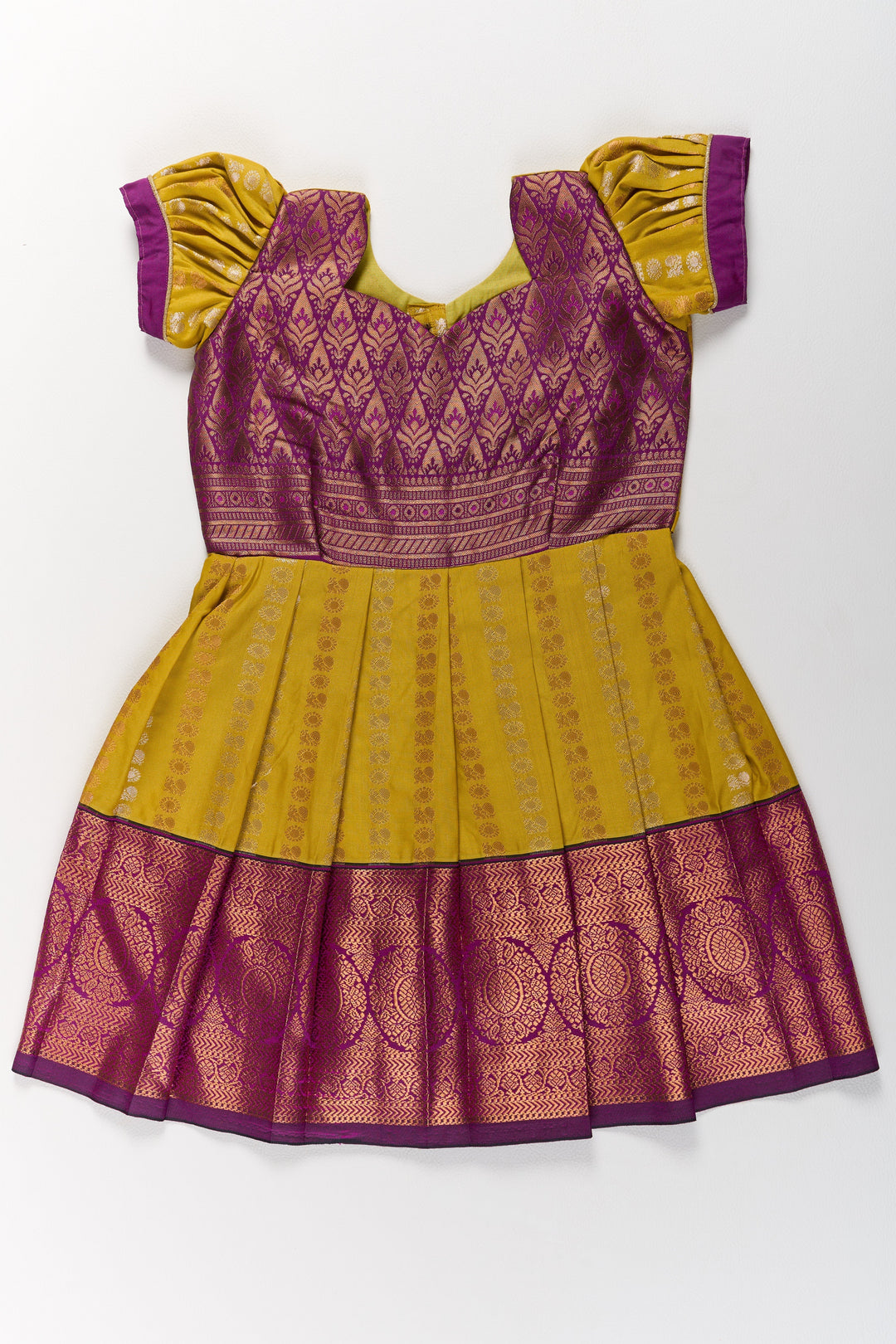 The Nesavu Girls Kanchi Silk Frock Mustard and Maroon Pattu Pavadai for Girls with Elegant Zari Motifs Nesavu Mustard Maroon Pattu Pavadai Girls Elegant Zari Motifs | The Nesavu