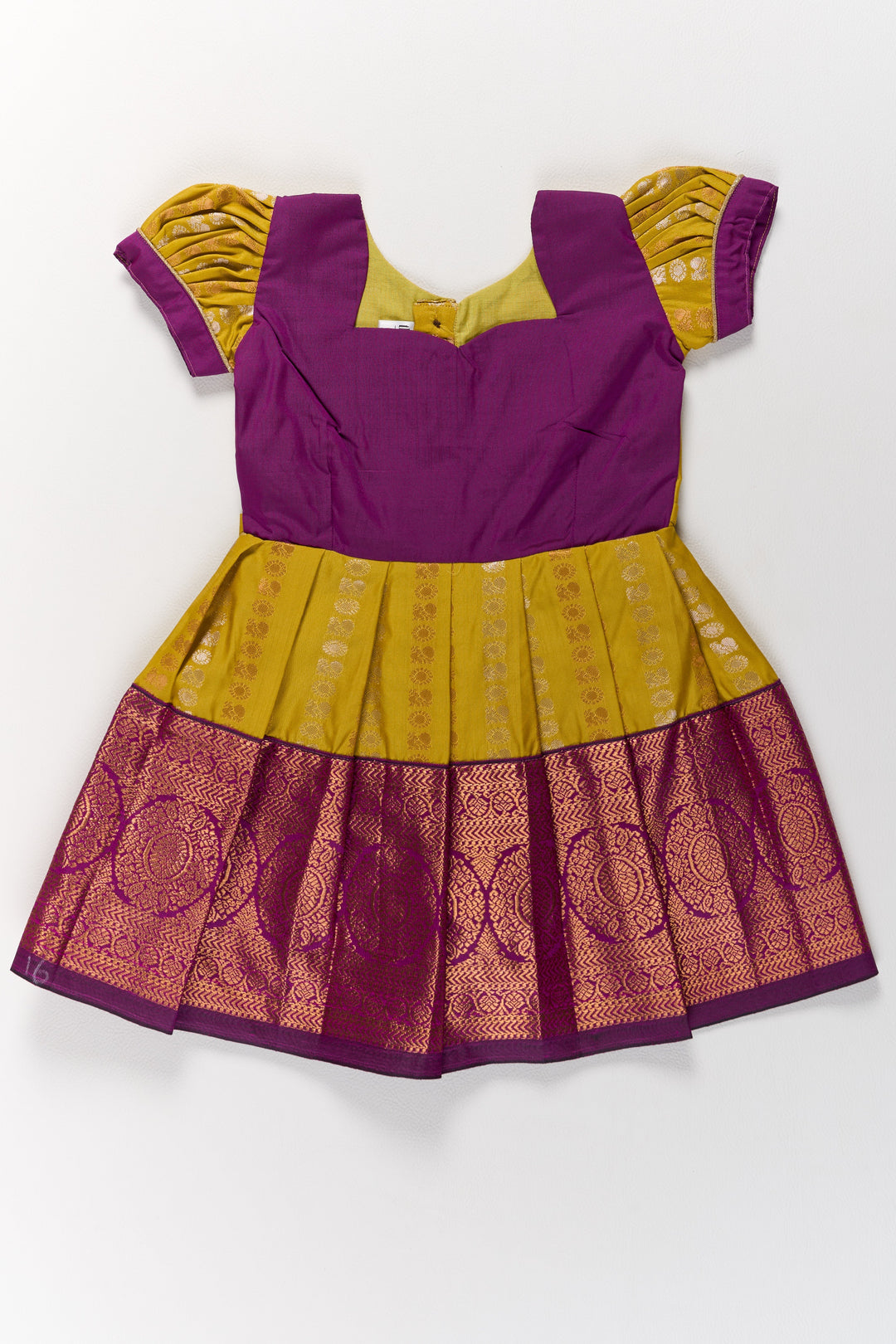 The Nesavu Girls Kanchi Silk Frock Mustard and Maroon Pattu Pavadai for Girls with Elegant Zari Motifs Nesavu Nesavu Mustard Maroon Pattu Pavadai Girls Elegant Zari Motifs